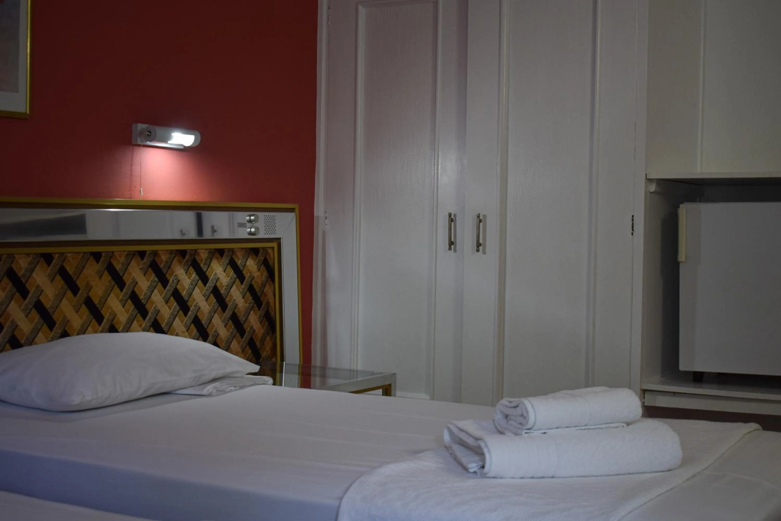 Bed in Hotel Theoxenia