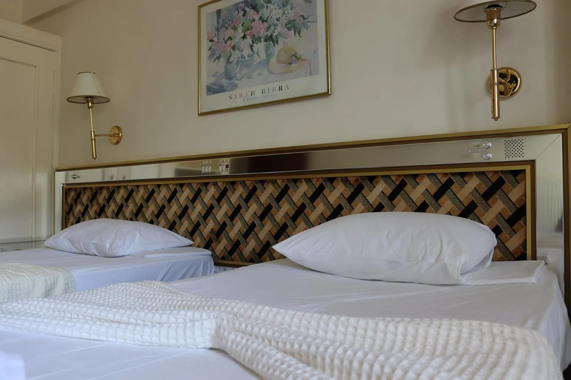 Bed in Hotel Theoxenia