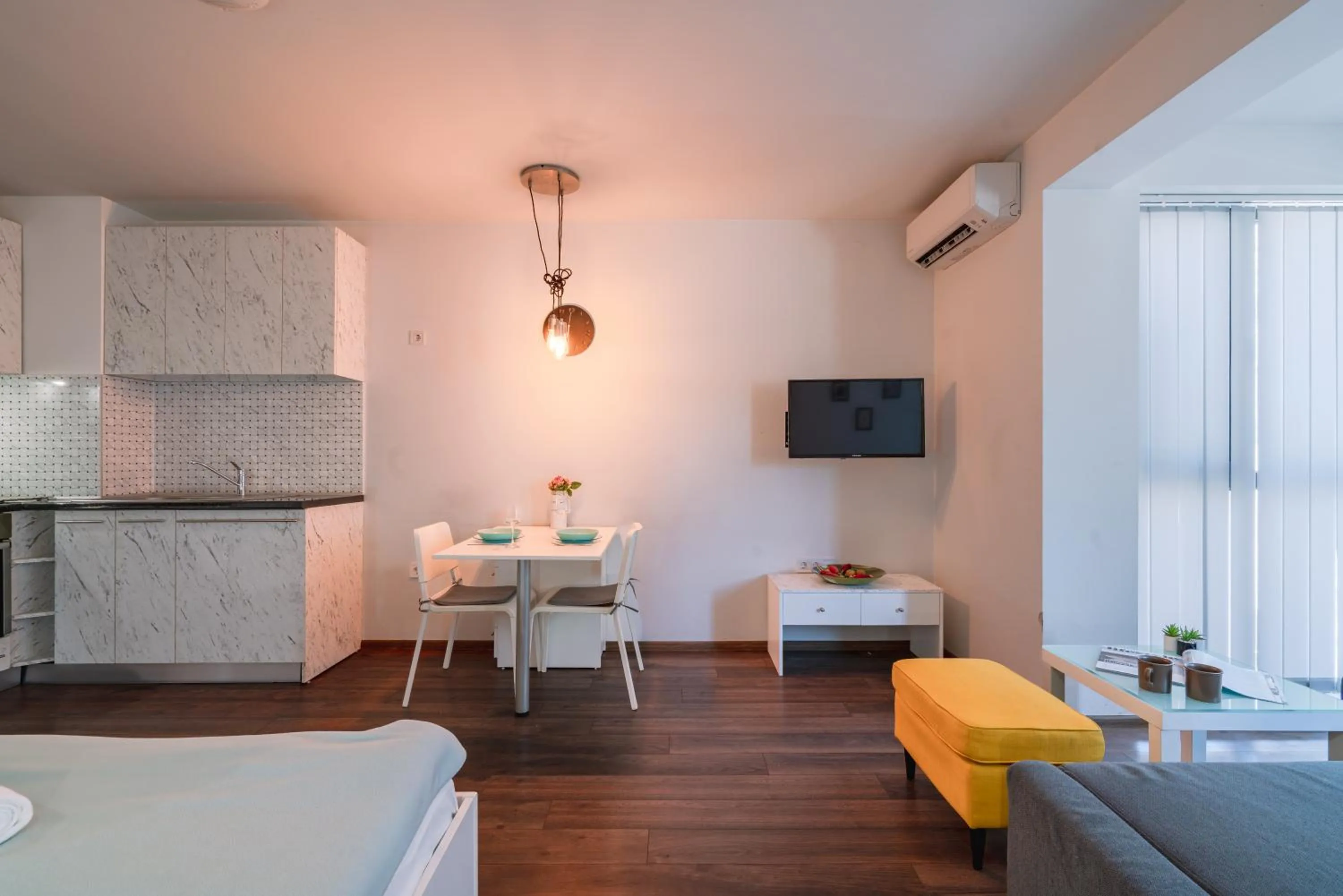 Photo of the whole room, Bed in Bright Studio in the City Center