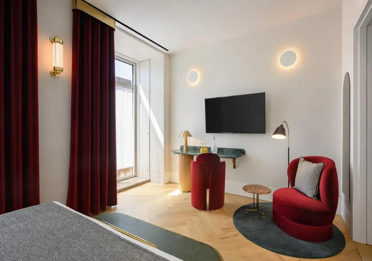 Seating area, Bed in Montebelo Vista Alegre Lisboa Chiado Hotel Seating area, Bed in Montebelo Vista Alegre Lisboa Chiado Hotel