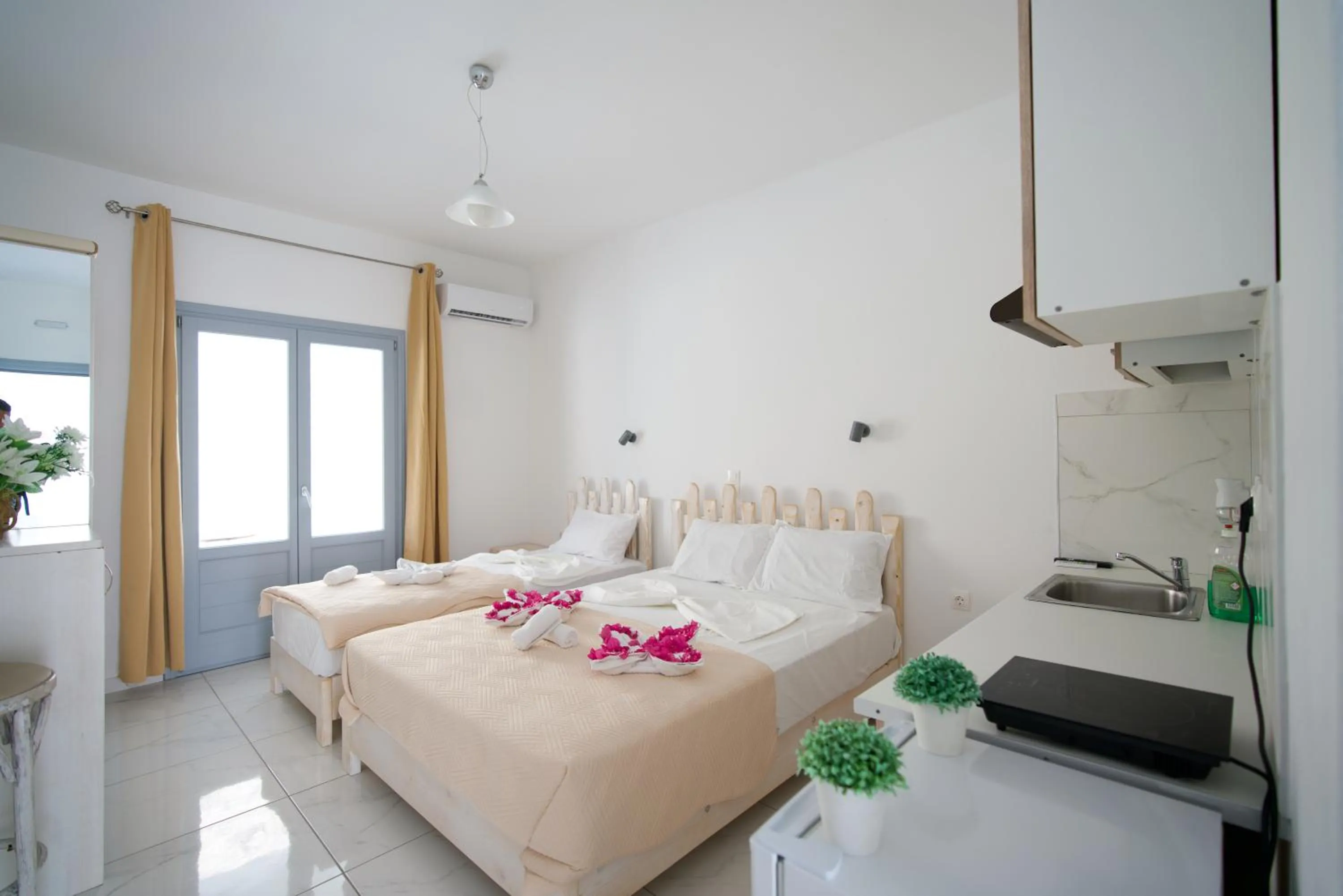 Photo of the whole room, Bed in Dodomar Selections