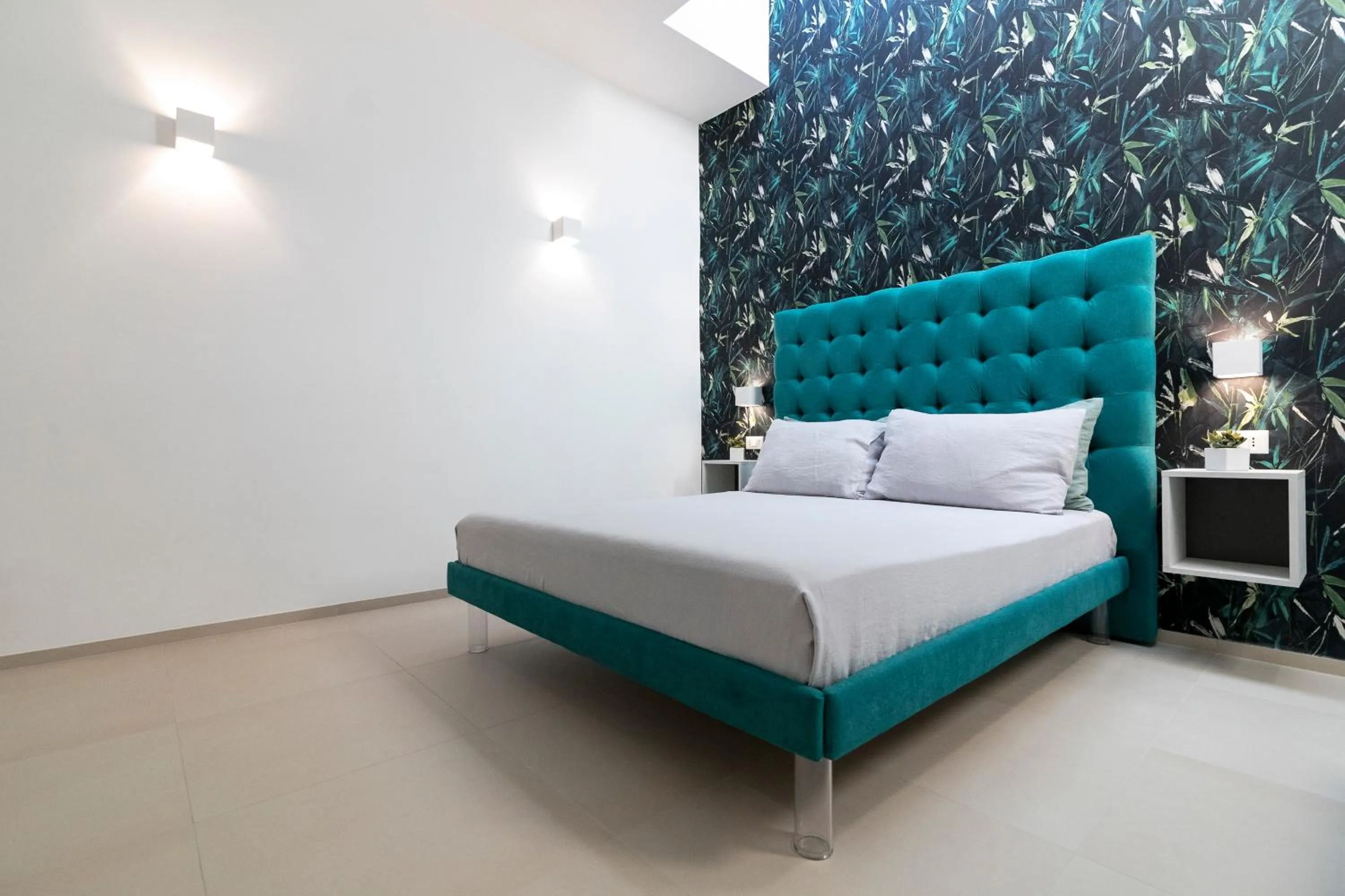 Bed in Stellaris Apartrooms