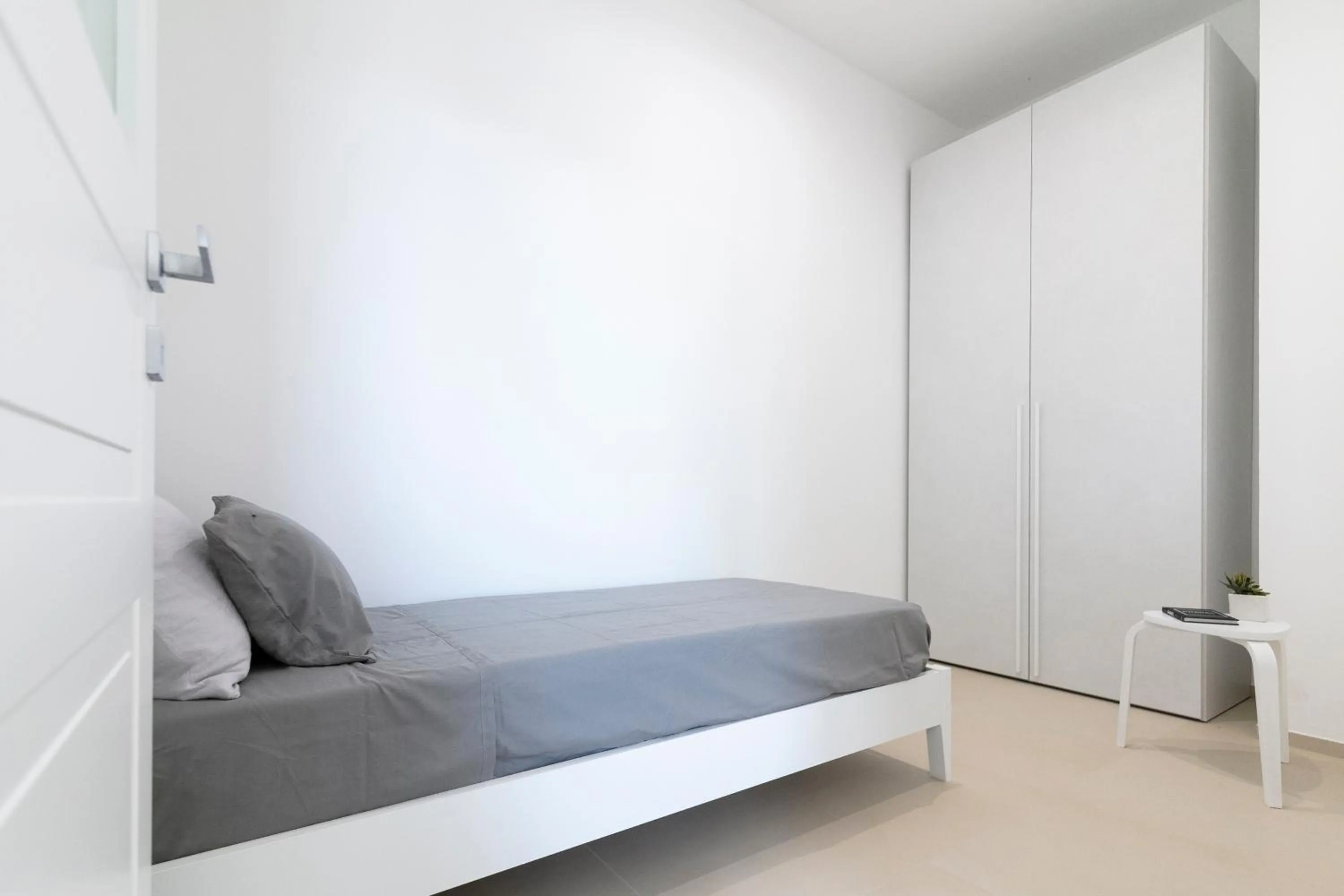 Bed in Stellaris Apartrooms