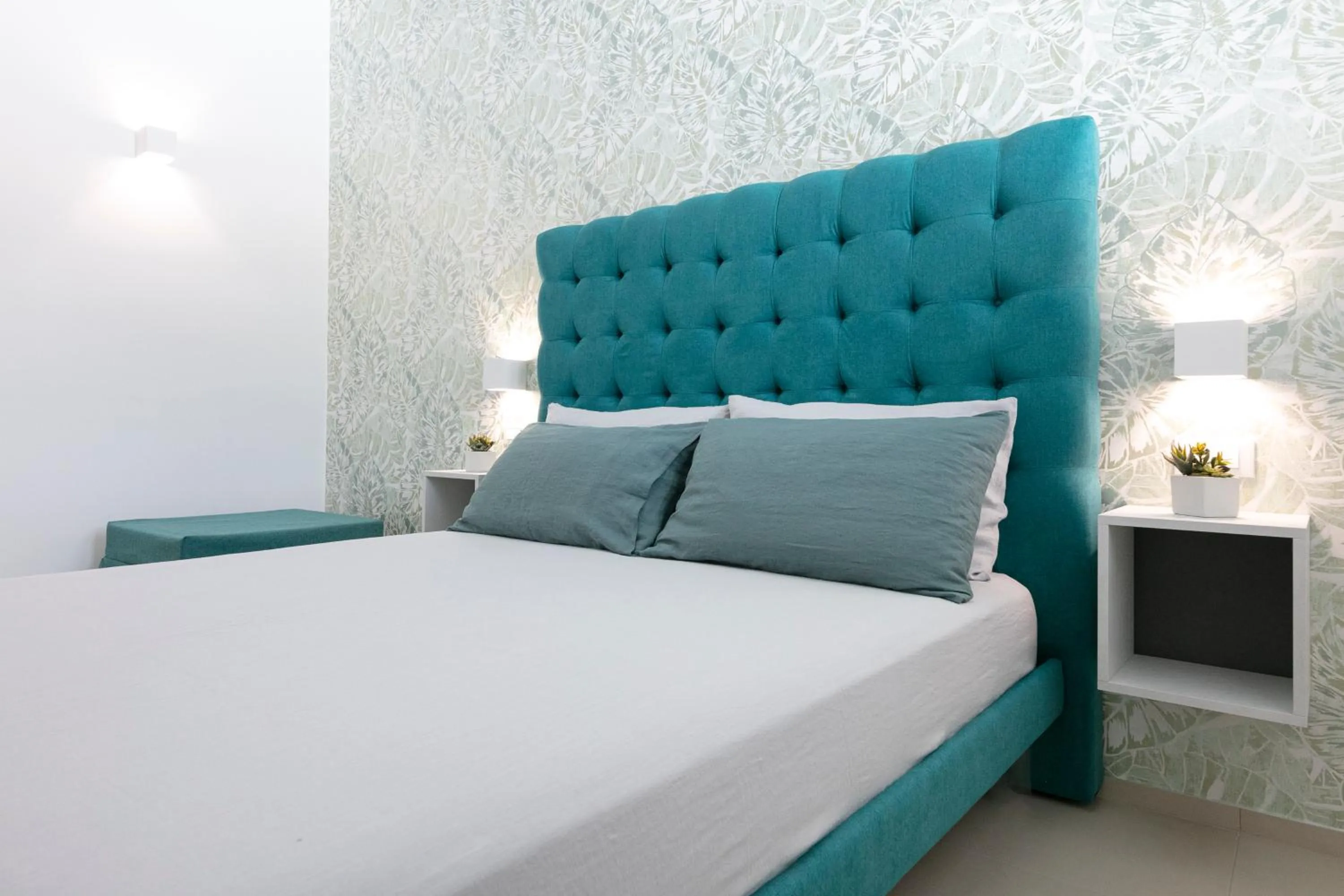 Bed in Stellaris Apartrooms