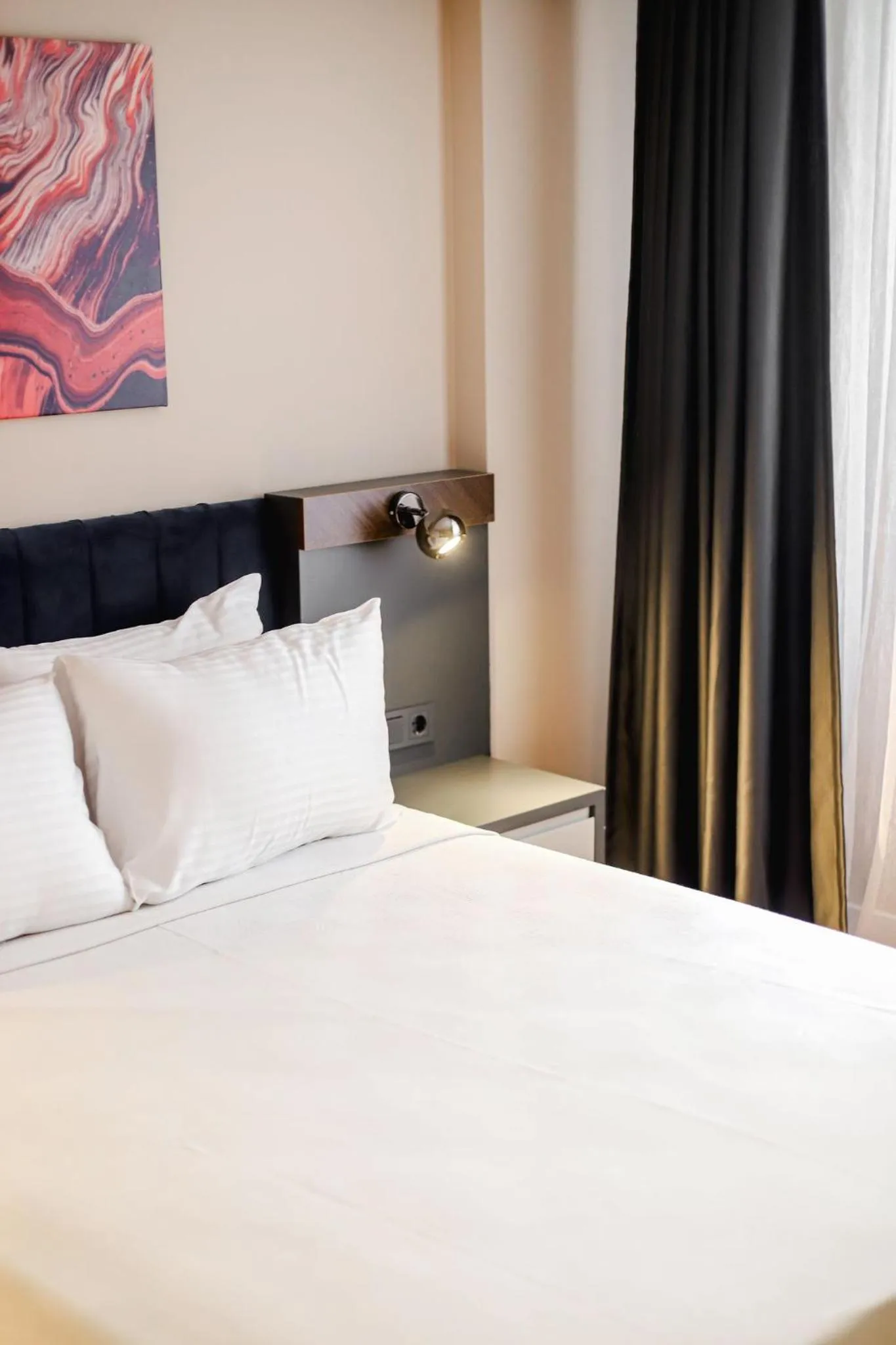 Bed in THE ROYALS HOTEL