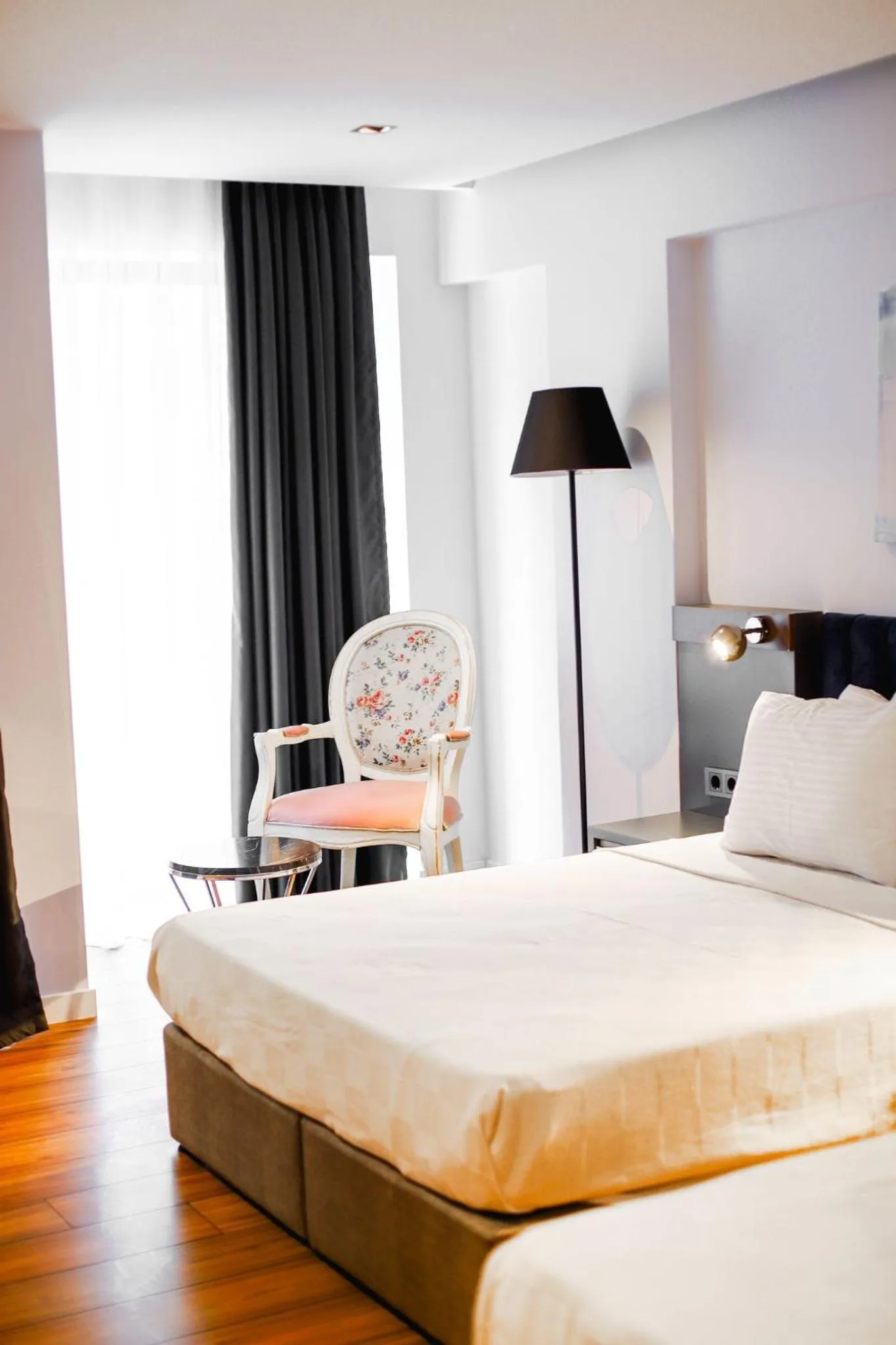 Bed in THE ROYALS HOTEL