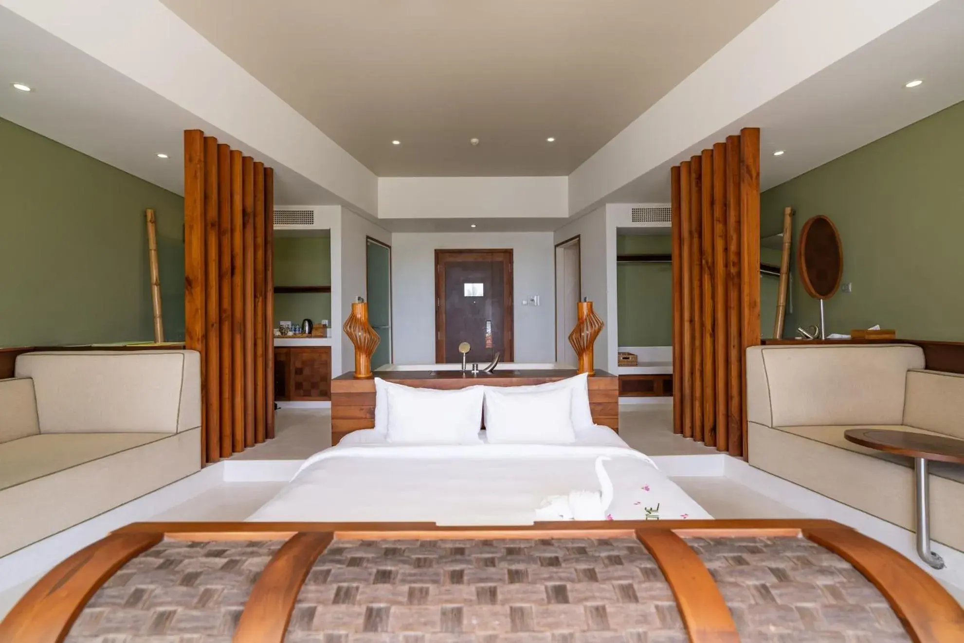 Bed in The Shells Resort & Spa Phu Quoc Bed in The Shells Resort & Spa Phu Quoc