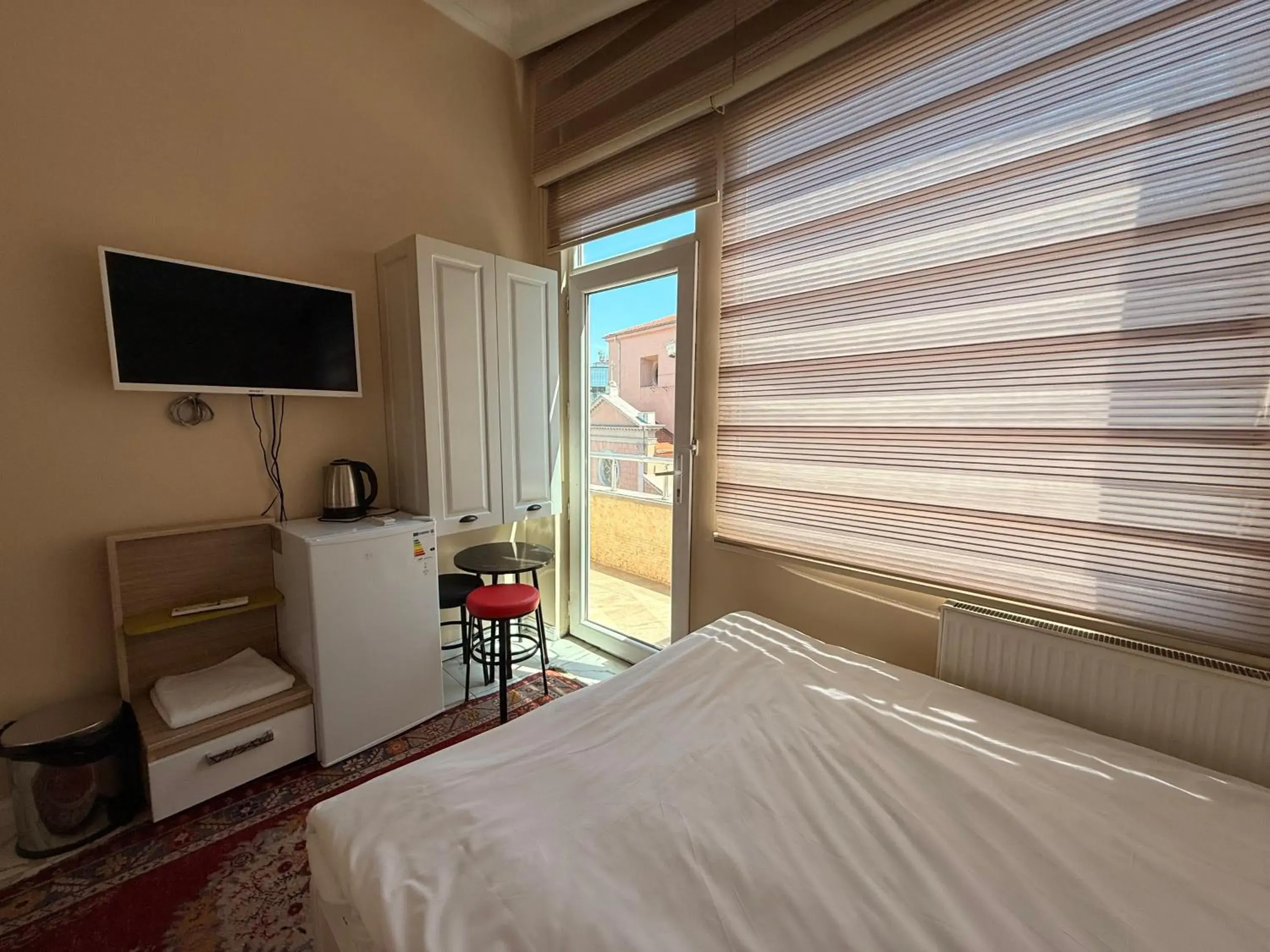 Bed in IQ Hotel Bed in IQ Hotel