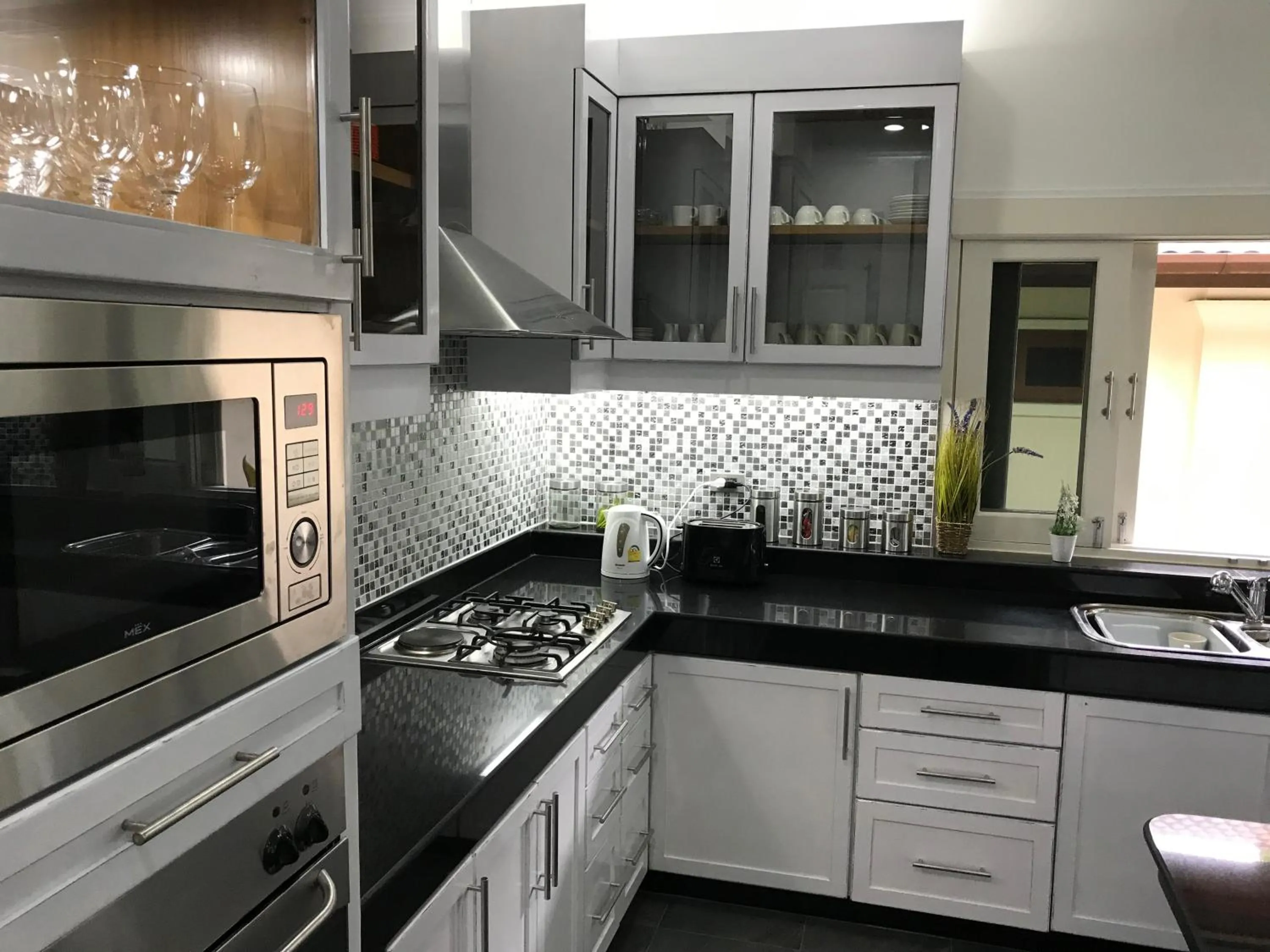 Kitchen or kitchenette in Villa Oriole