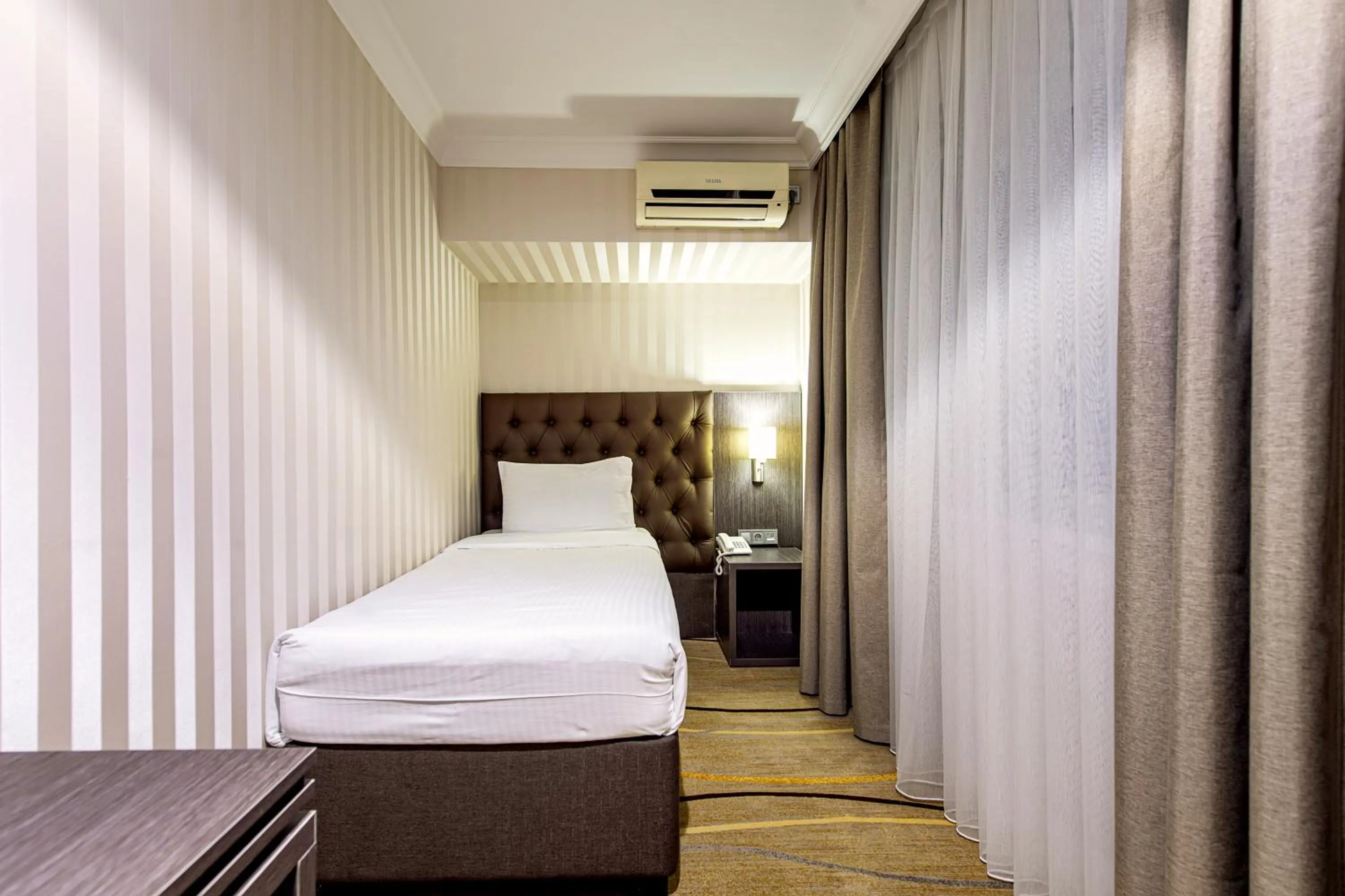 Bed in Shymkent Grand Hotel