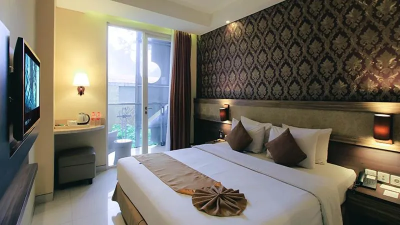 Bed in Crystal Lotus Hotel Yogyakarta