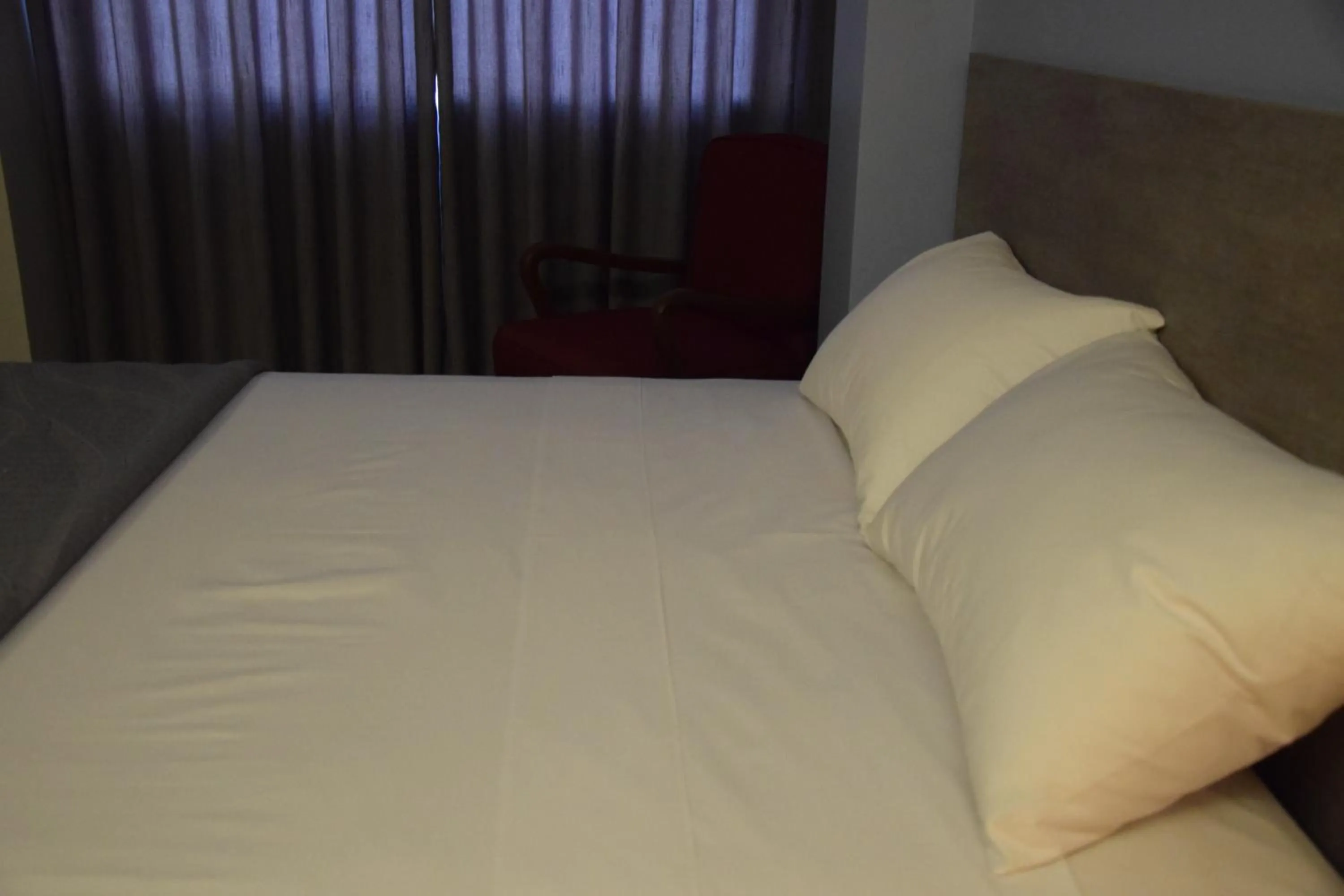 Bedroom, Bed in Izza Hotel