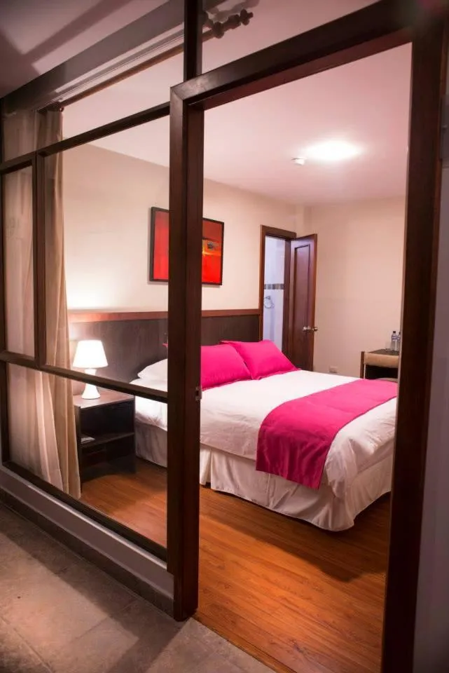 Bed in Hostal Casa de Lidice
