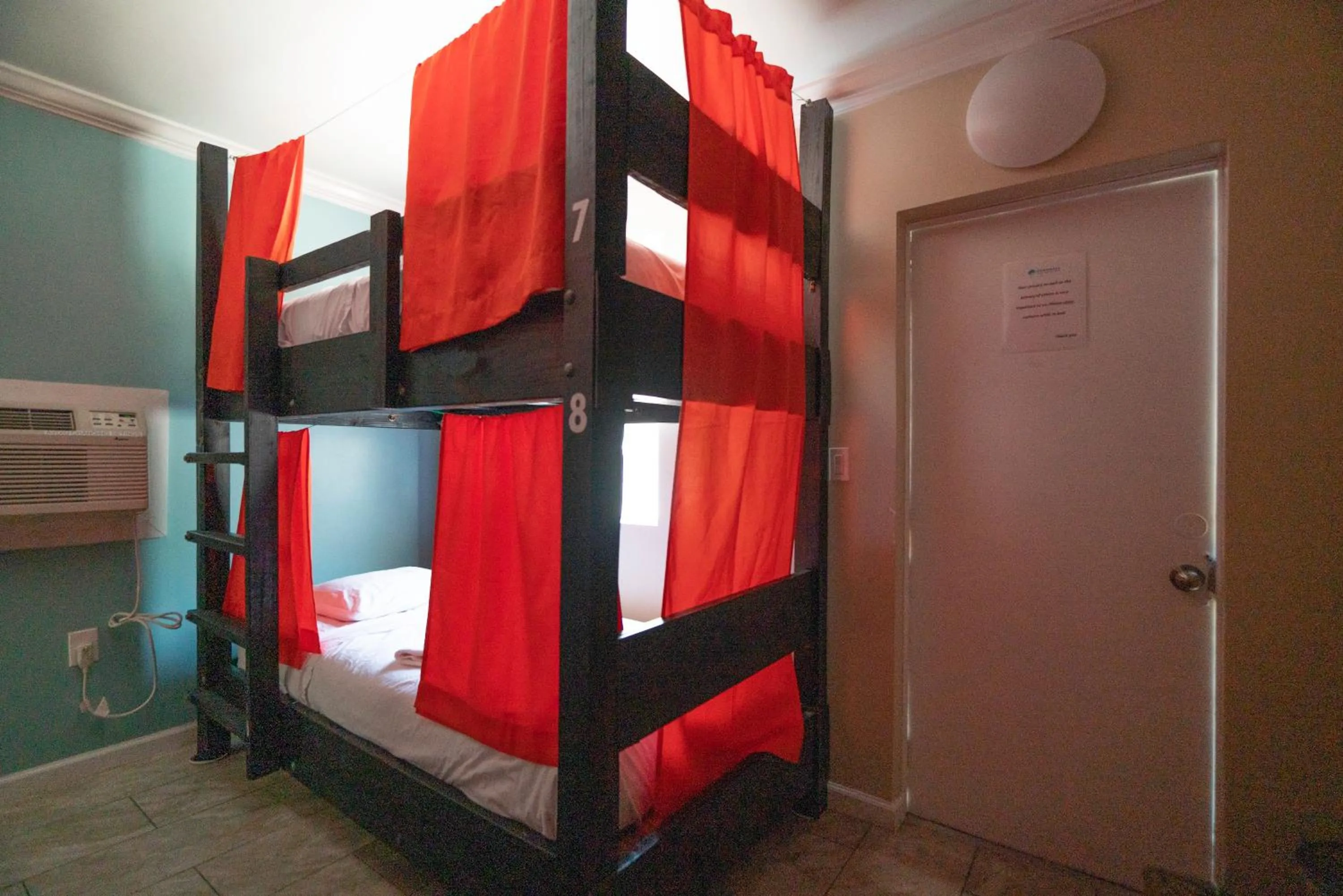 Bed in Seashell Motel and International Hostel