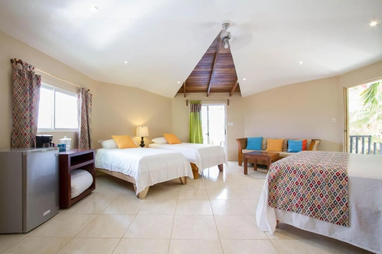 Bed in Tamarindo Village Hotel
