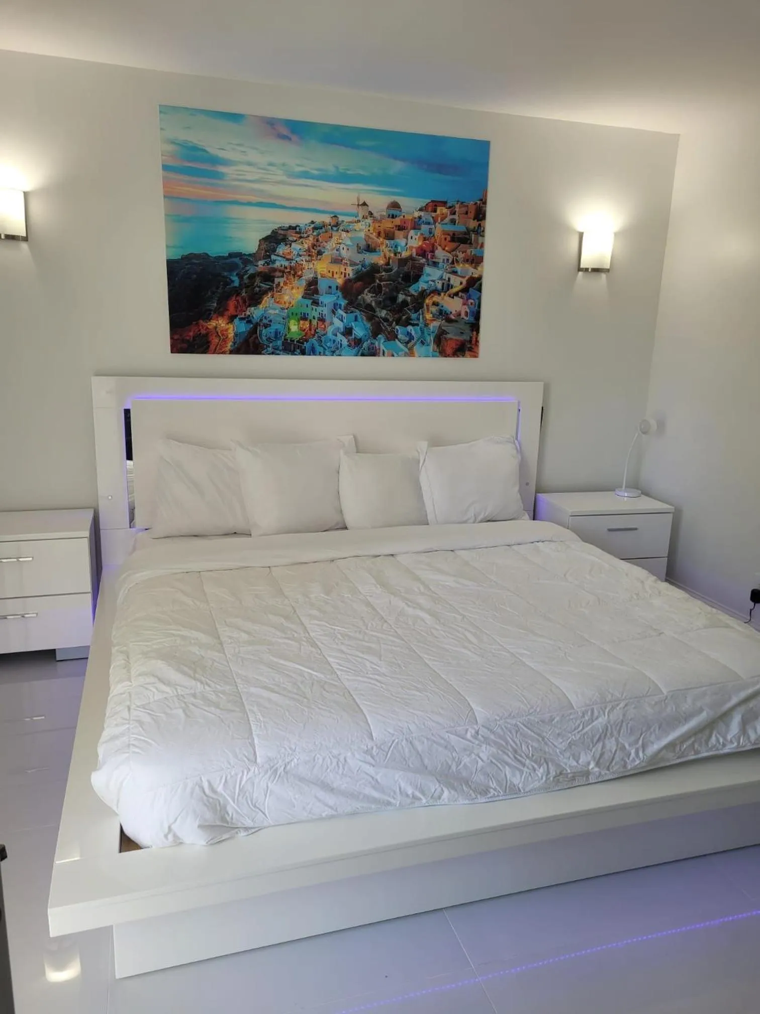Bed in Palm Breeze Hotel