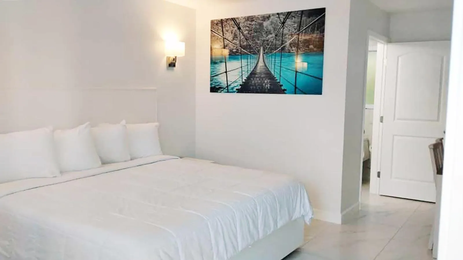 Bed in Palm Breeze Hotel