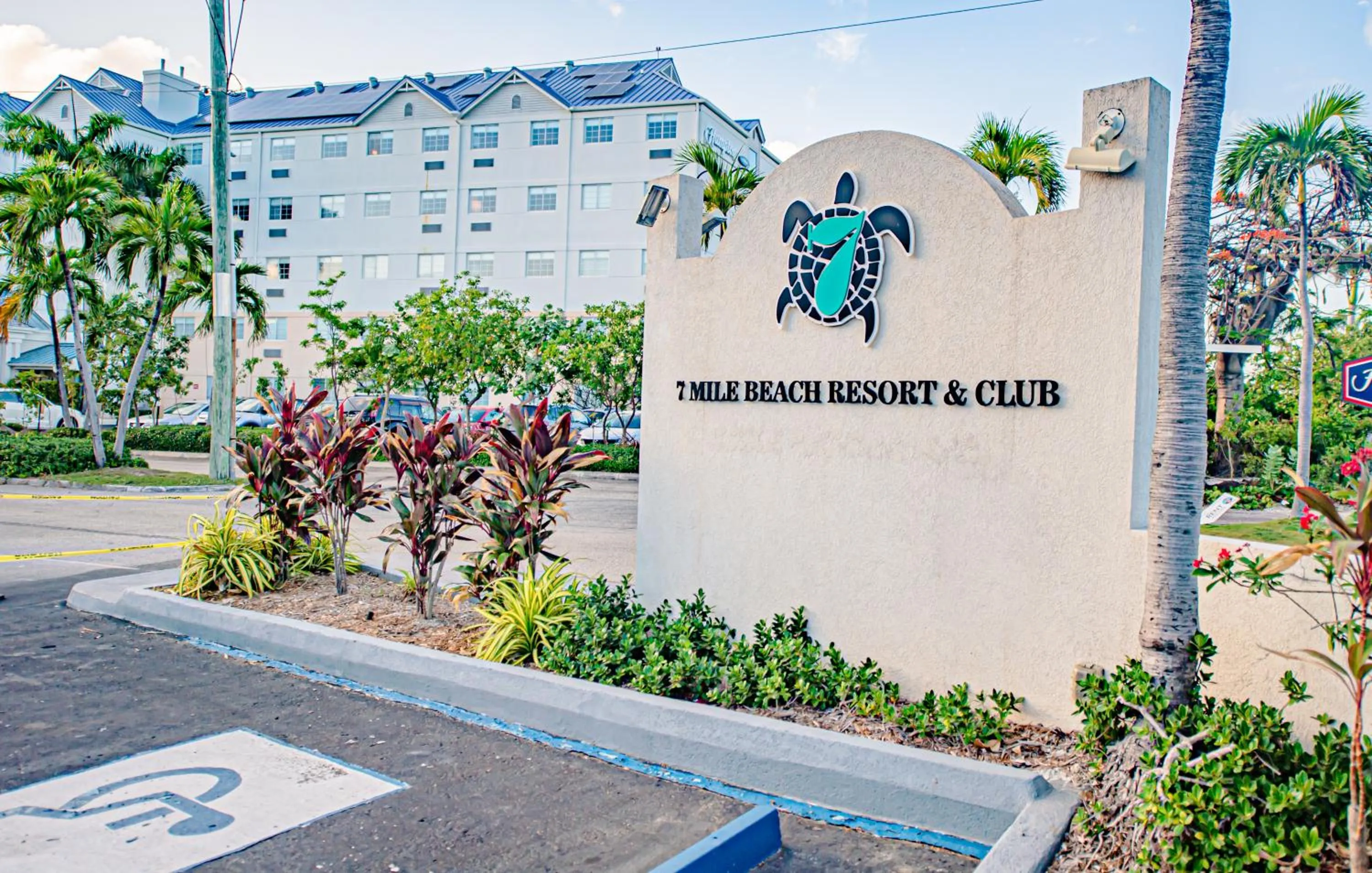 Property logo or sign in Seven Mile Beach Resort