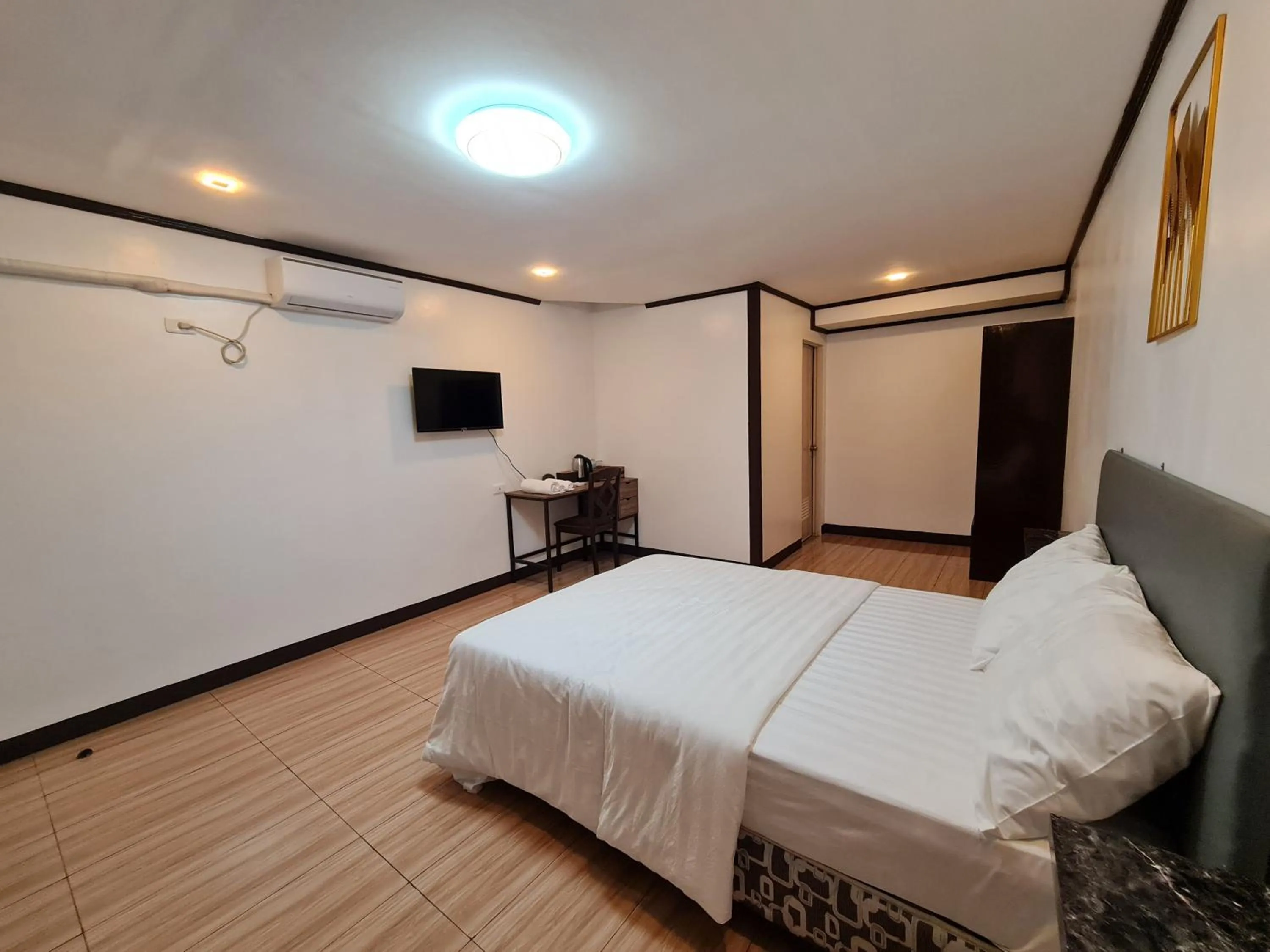 Bed in Hideaways Restobar and Resort