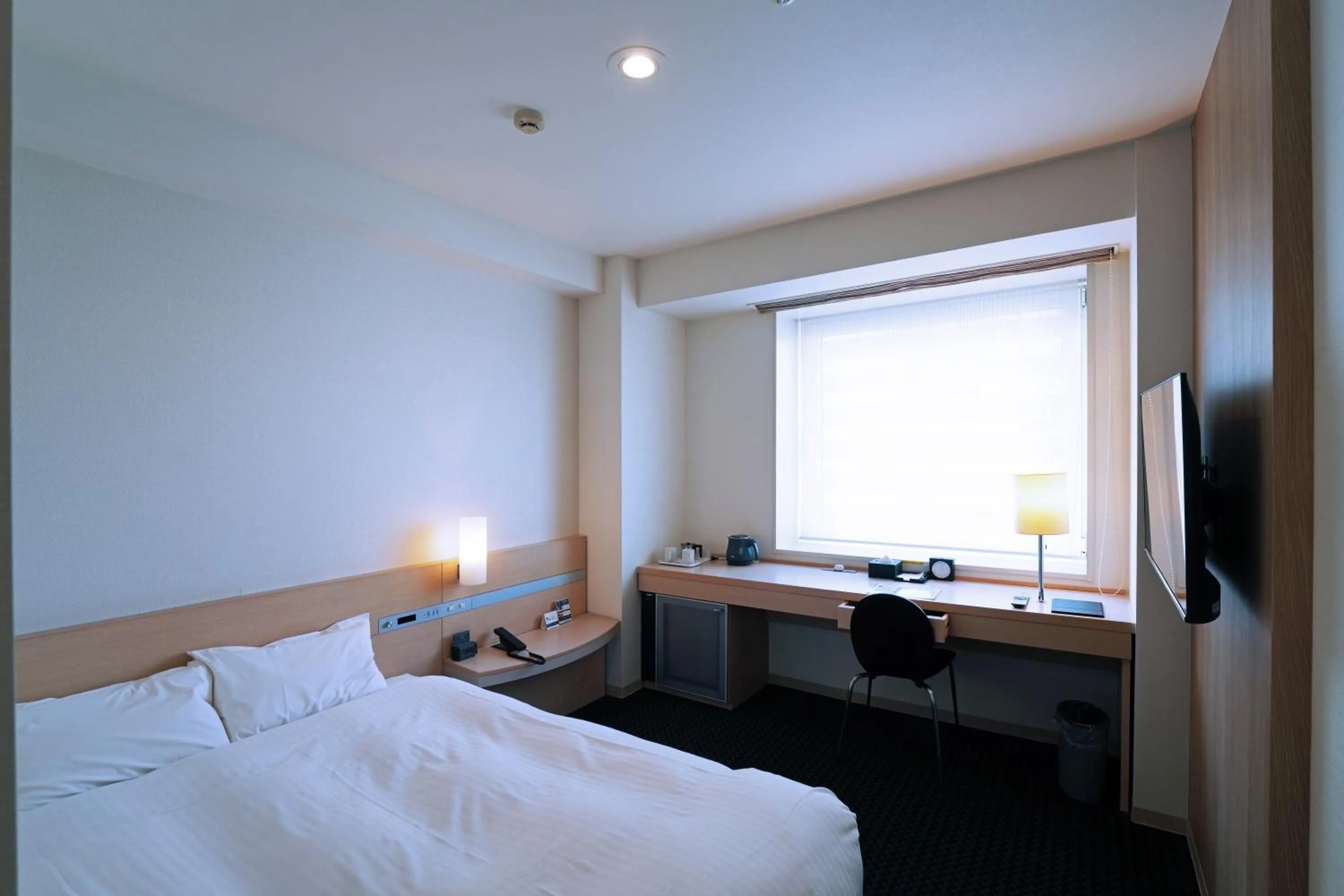 Photo of the whole room, Bed in KOKO HOTEL Sendai Kotodai Park