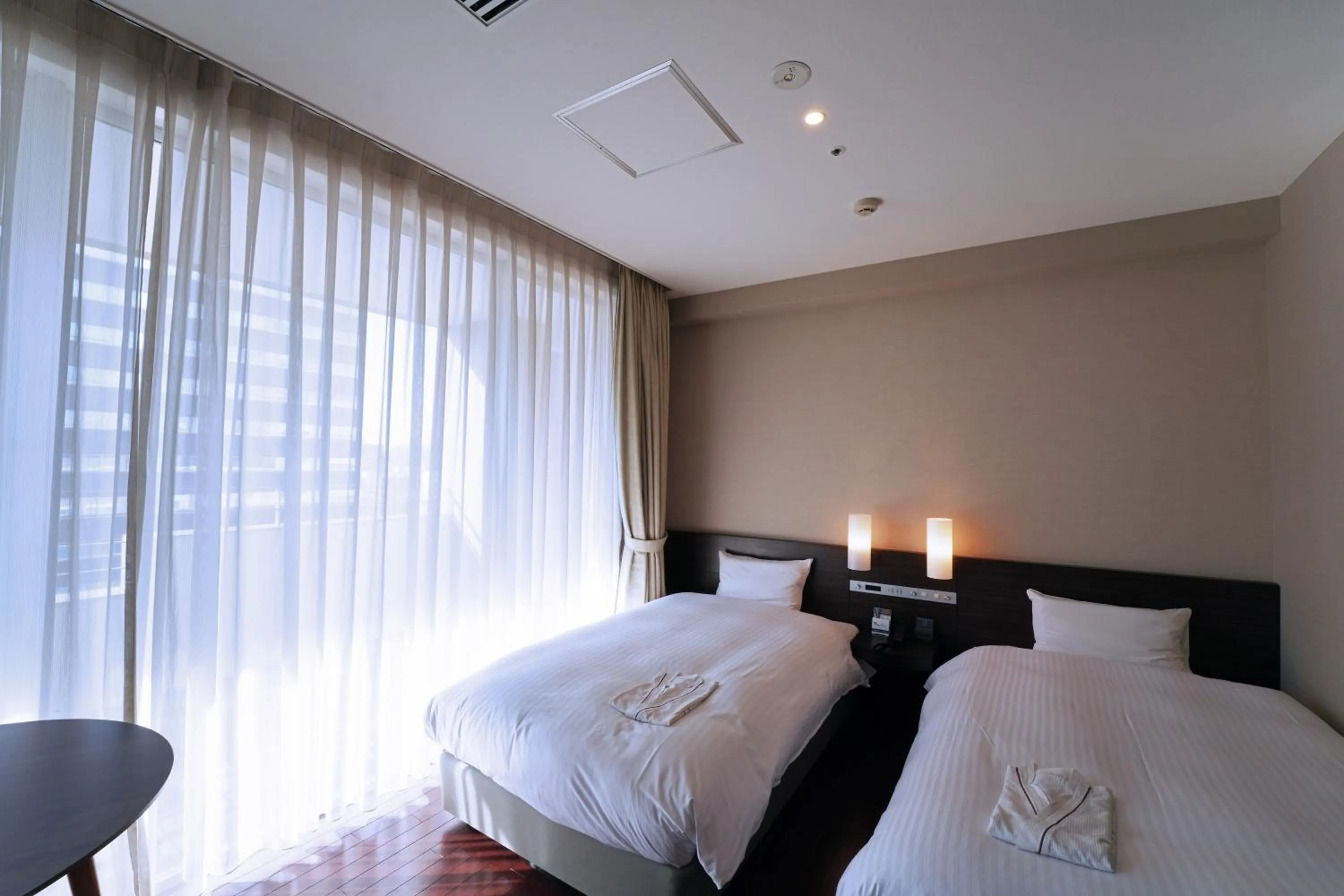 Photo of the whole room, Bed in KOKO HOTEL Sendai Kotodai Park