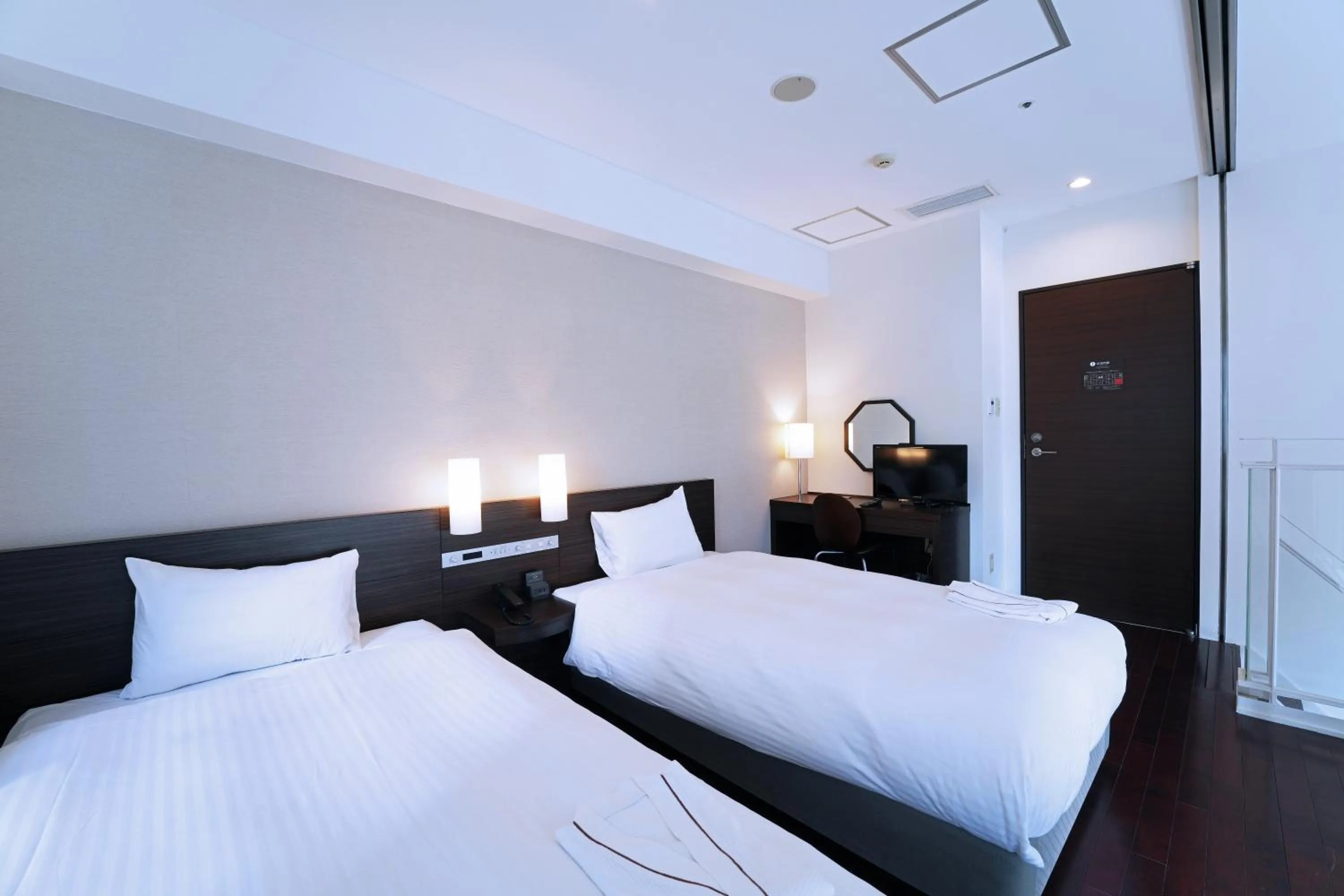 Photo of the whole room, Bed in KOKO HOTEL Sendai Kotodai Park