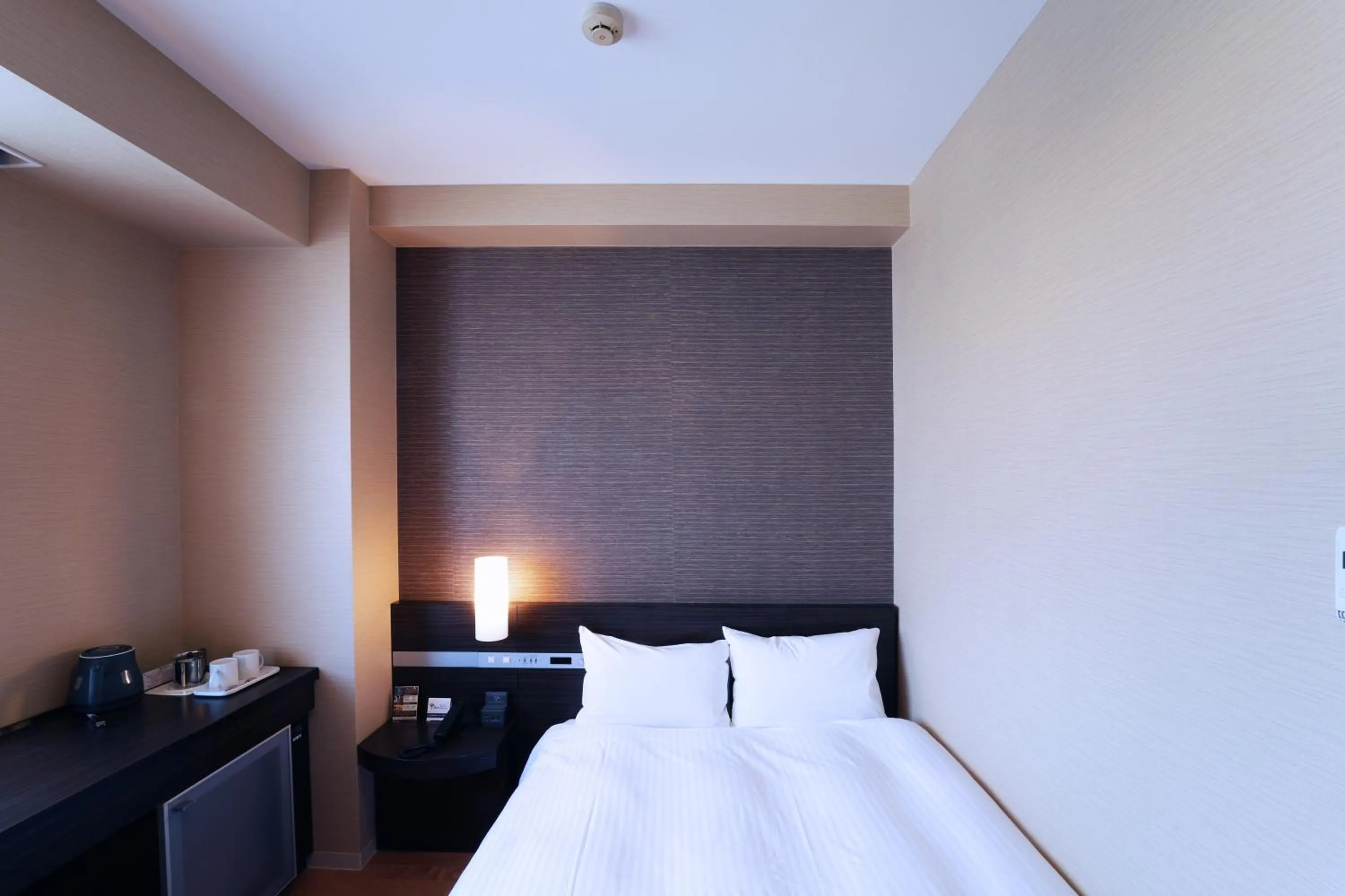 Photo of the whole room, Bed in KOKO HOTEL Sendai Kotodai Park