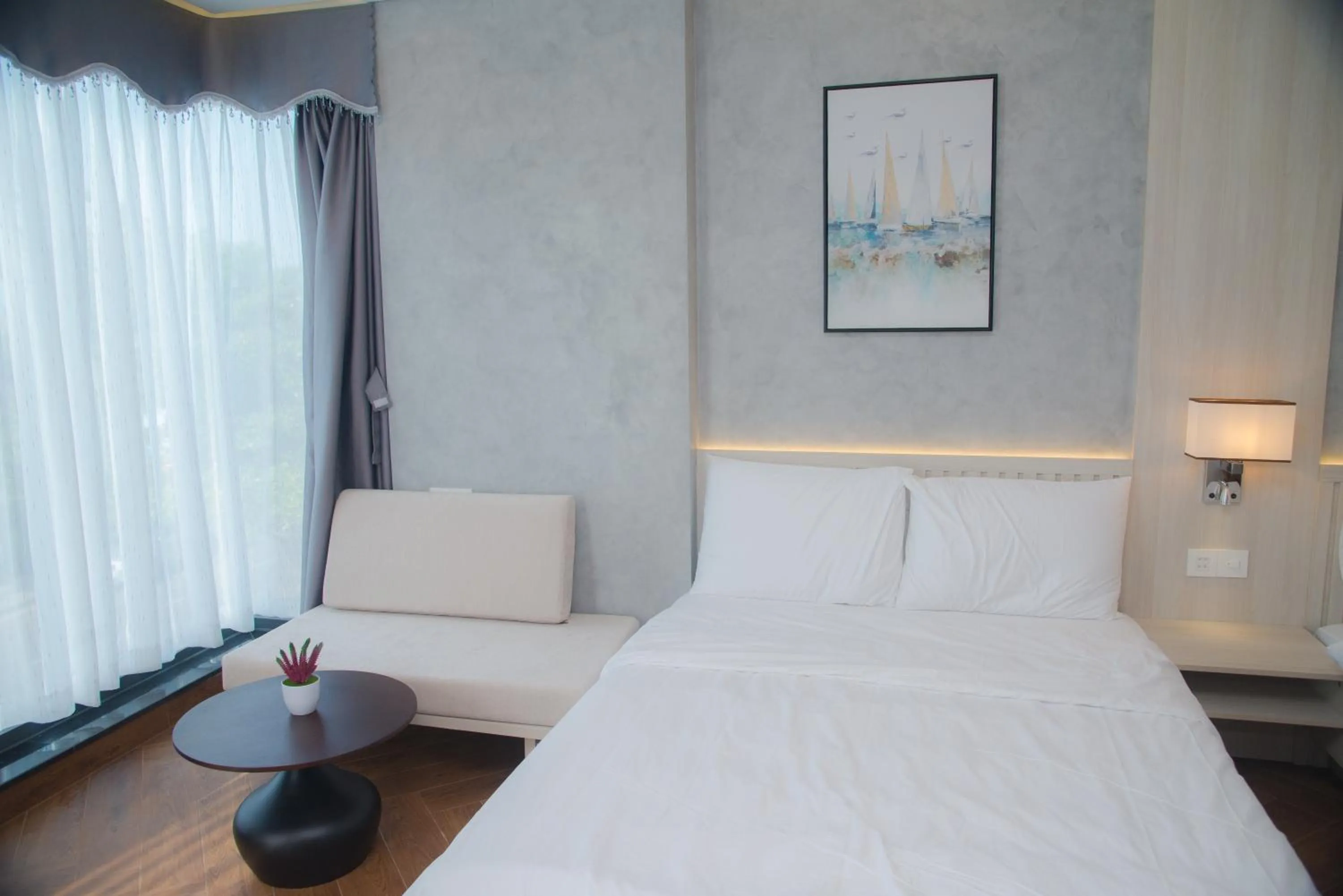 Bed in Y'S Sea House Hotel