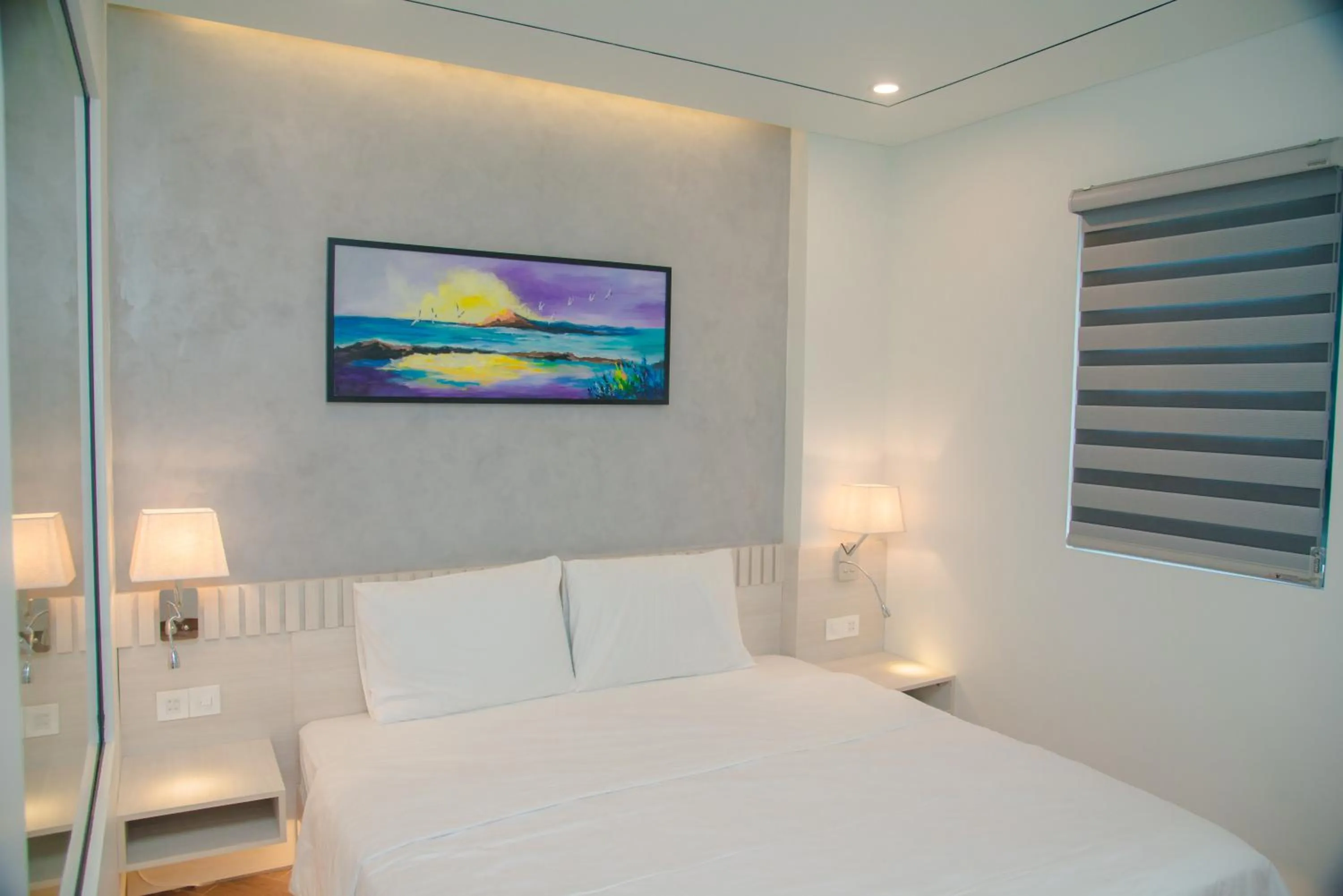 Bed in Y'S Sea House Hotel