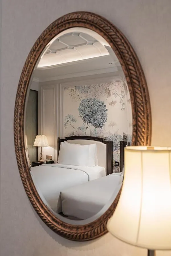 Bed in Golden Imperial Hotel