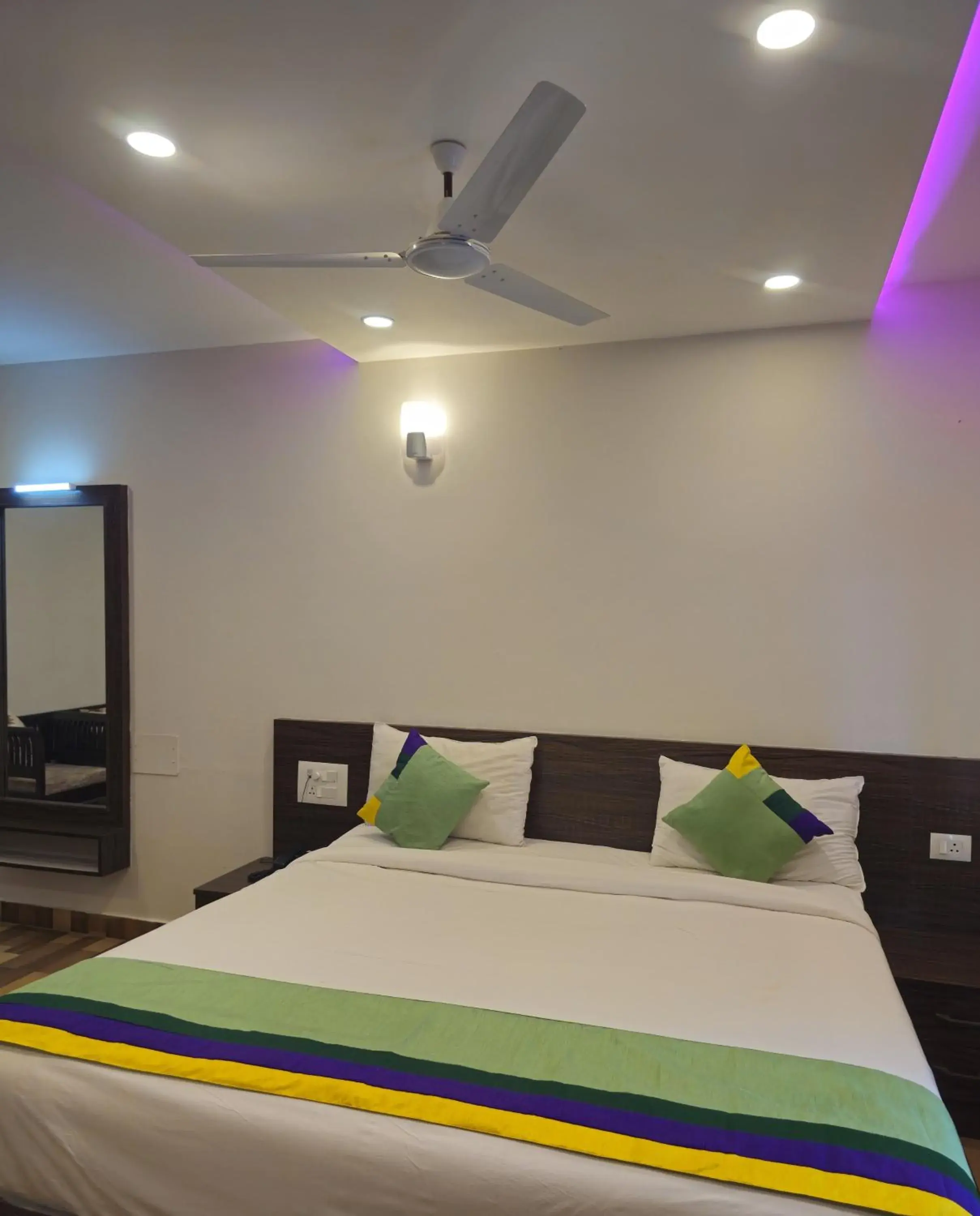 Bedroom, Bed in Treebo Elite Plaza, 700 Mtrs From Madikeri Fort Bedroom, Bed in Treebo Elite Plaza, 700 Mtrs From Madikeri Fort