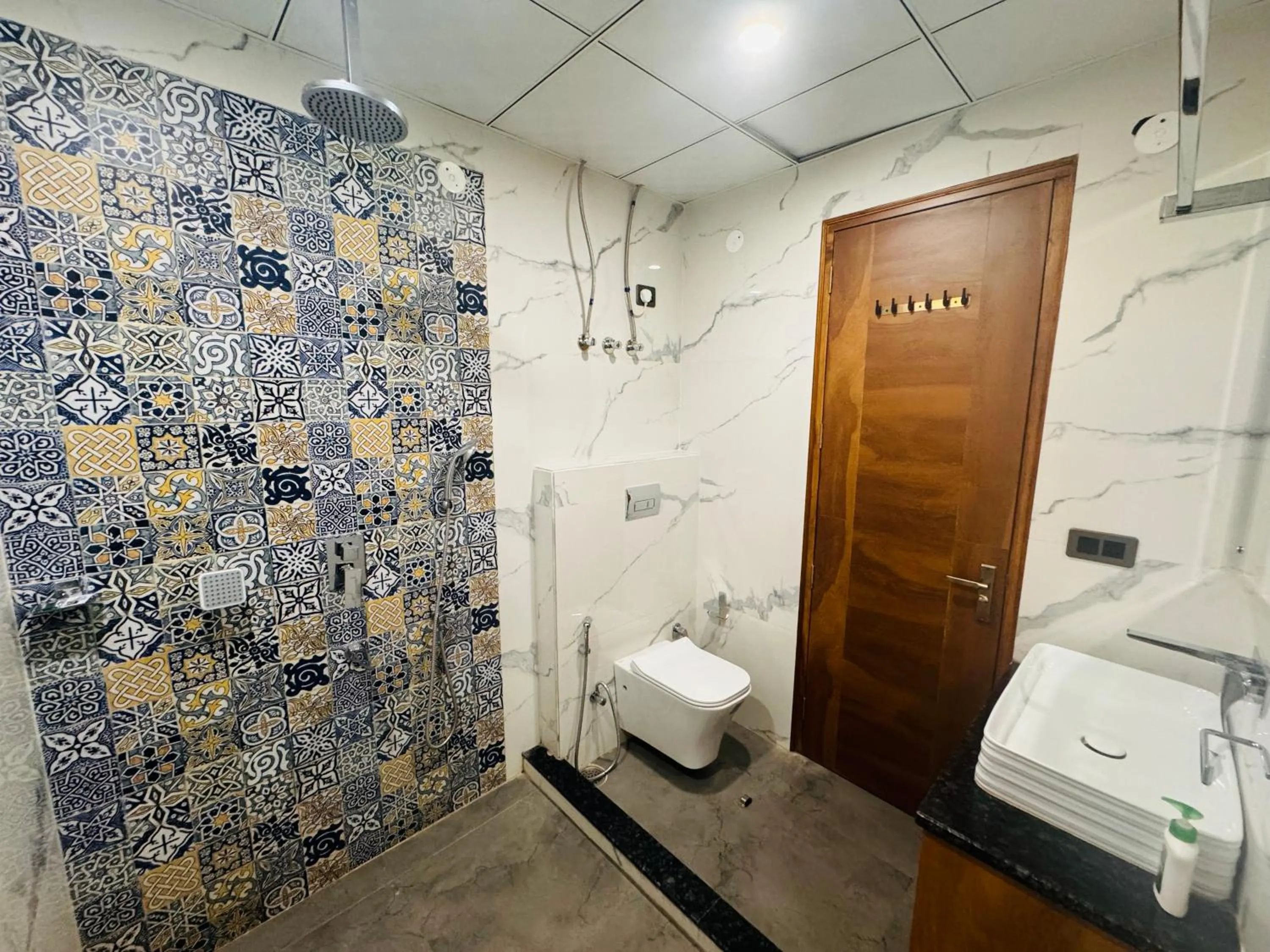 Shower in Masaga by Qcent, Gurugram