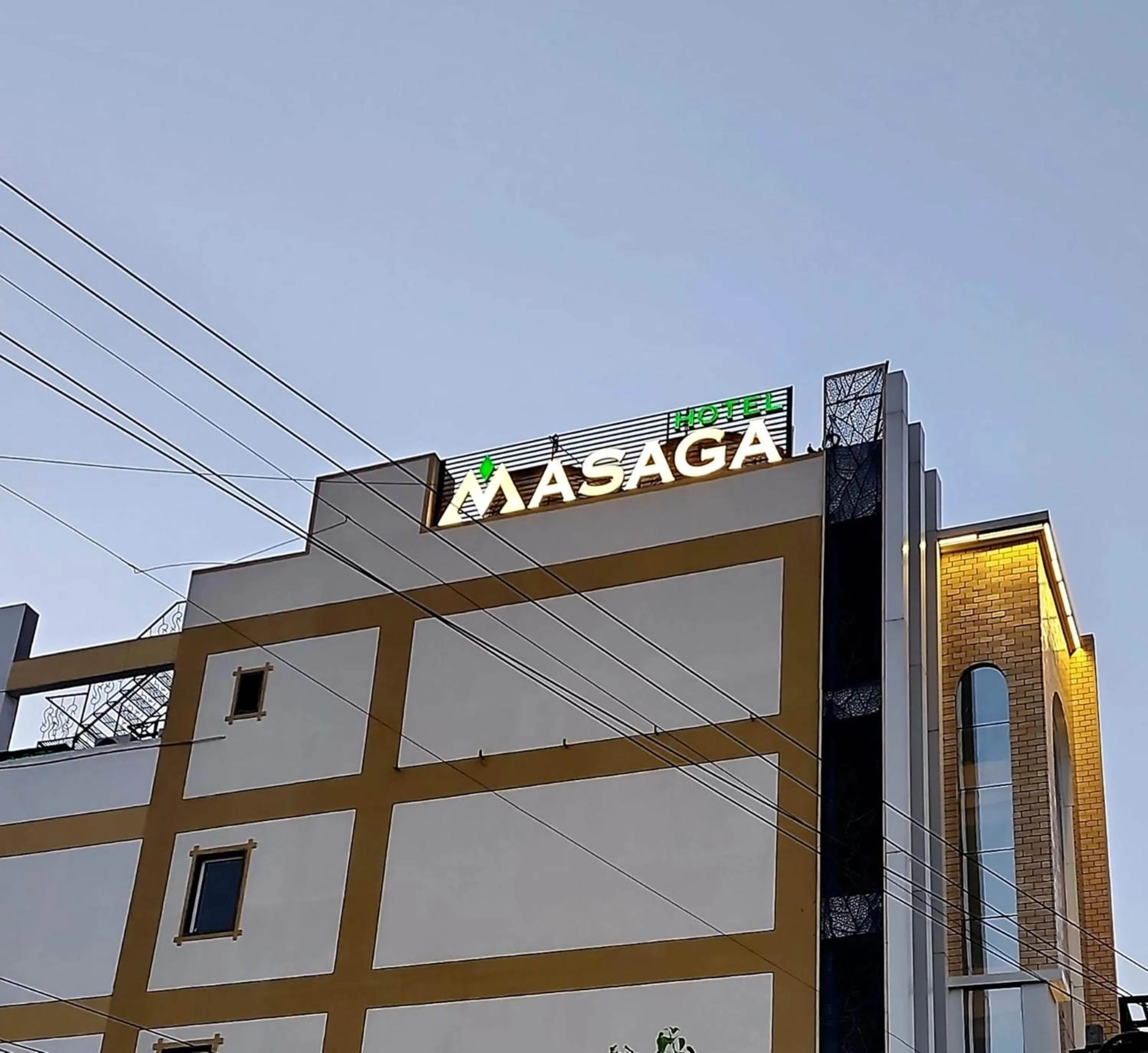 Property building in Masaga by Qcent, Gurugram