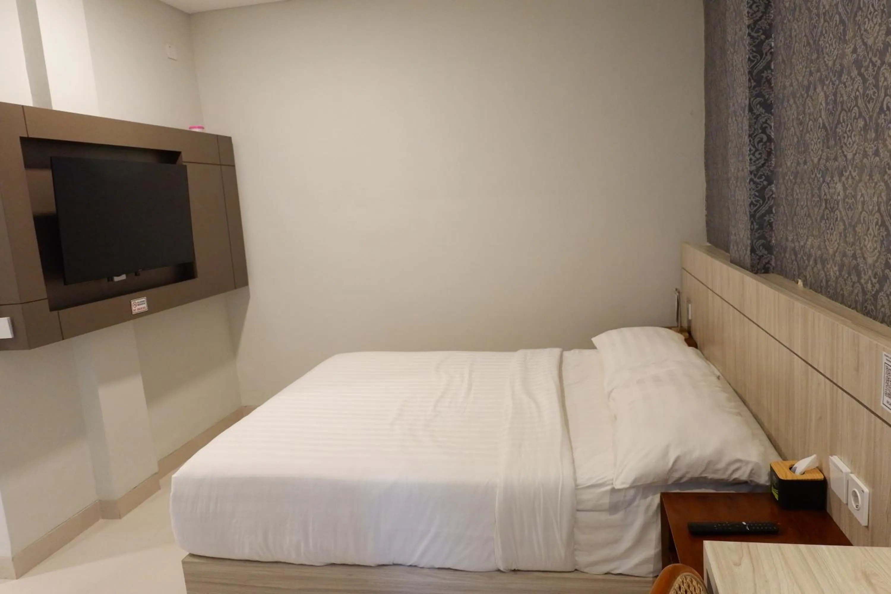 Bed in The Baliem Hotel