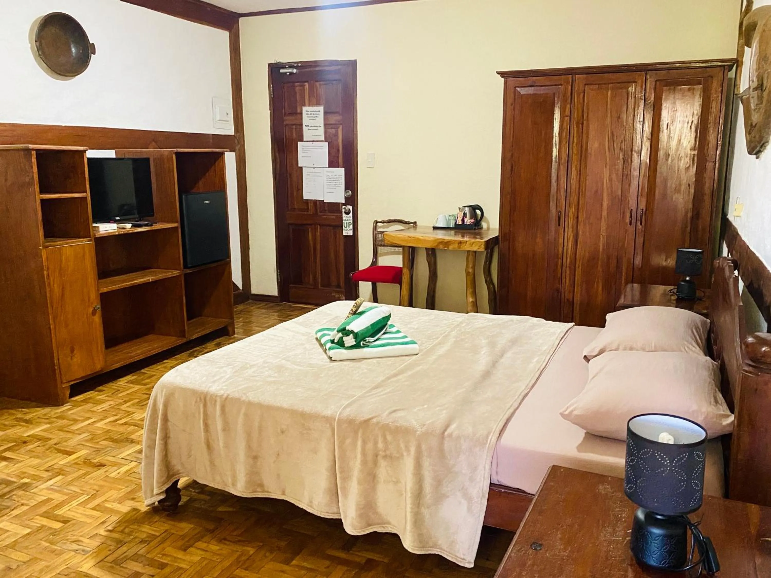 Bed in TipTop Hotel, Resto and Delishop