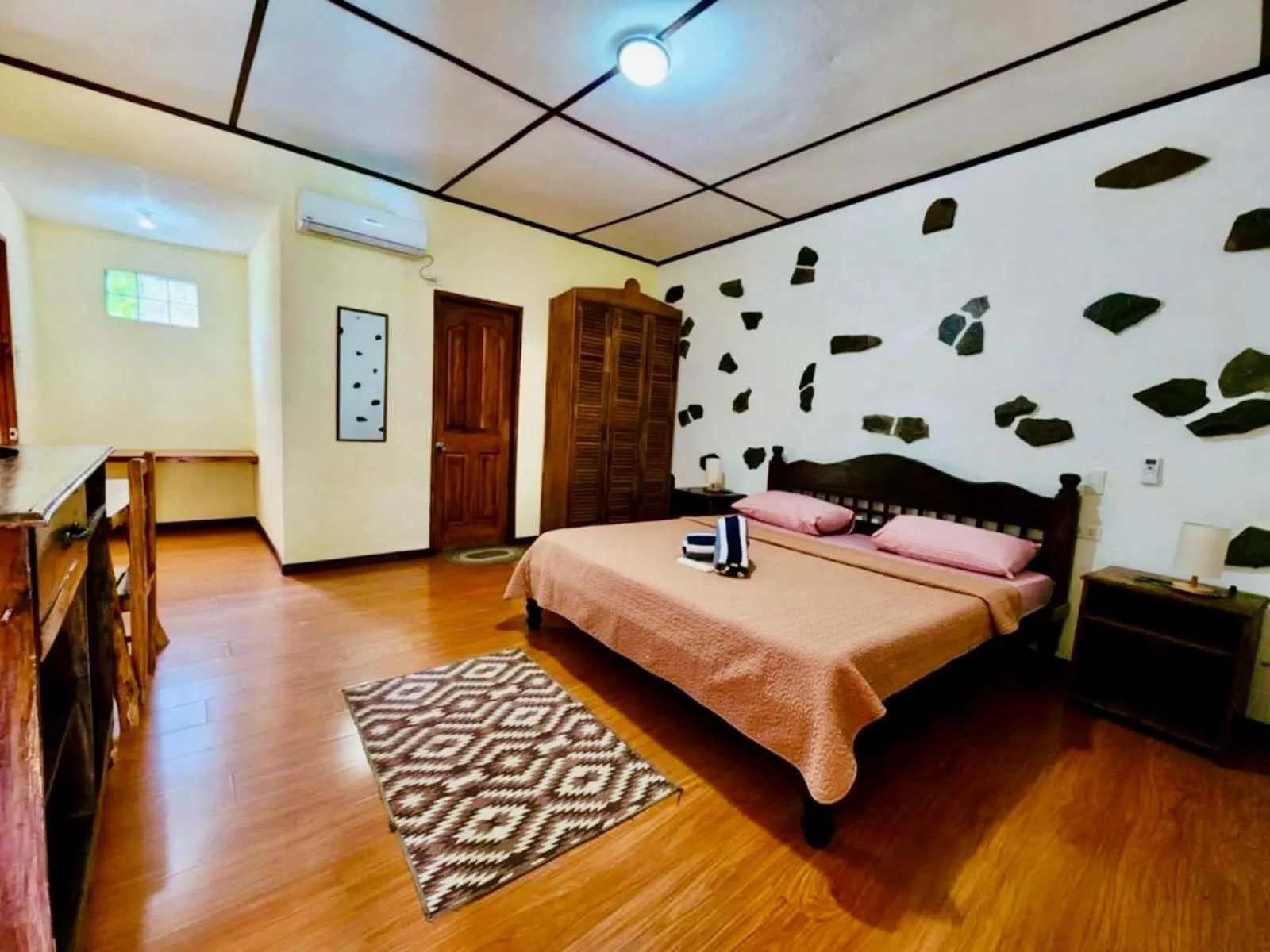 Bed in TipTop Hotel, Resto and Delishop