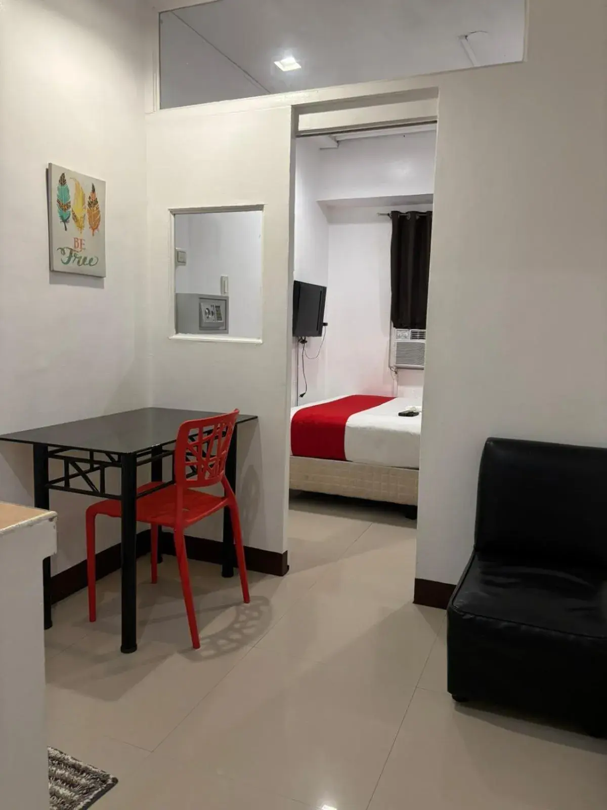 Dining area, Bed in Makati Poblacion Hotel Dining area, Bed in Makati Poblacion Hotel