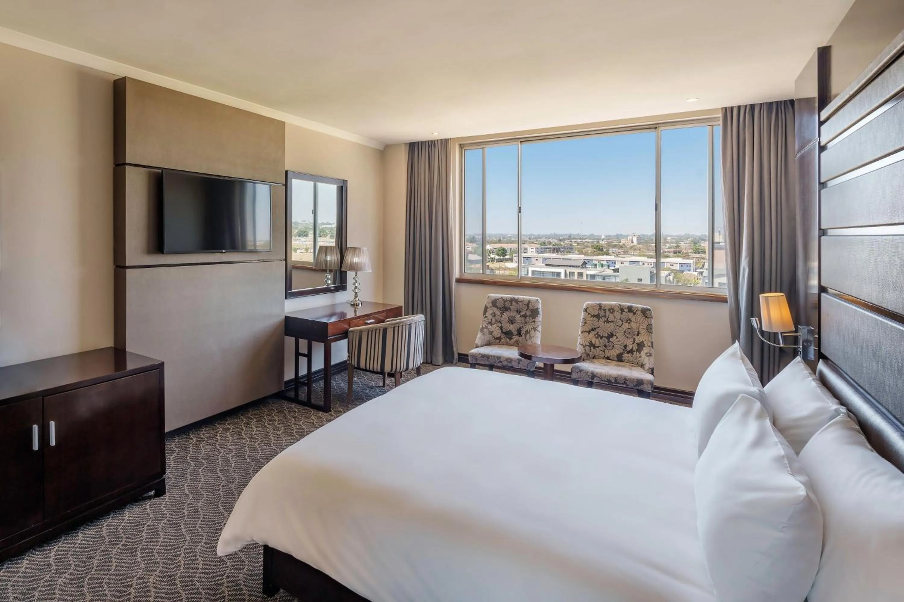 Photo of the whole room, Bed in Protea Hotel by Marriott Lusaka Tower