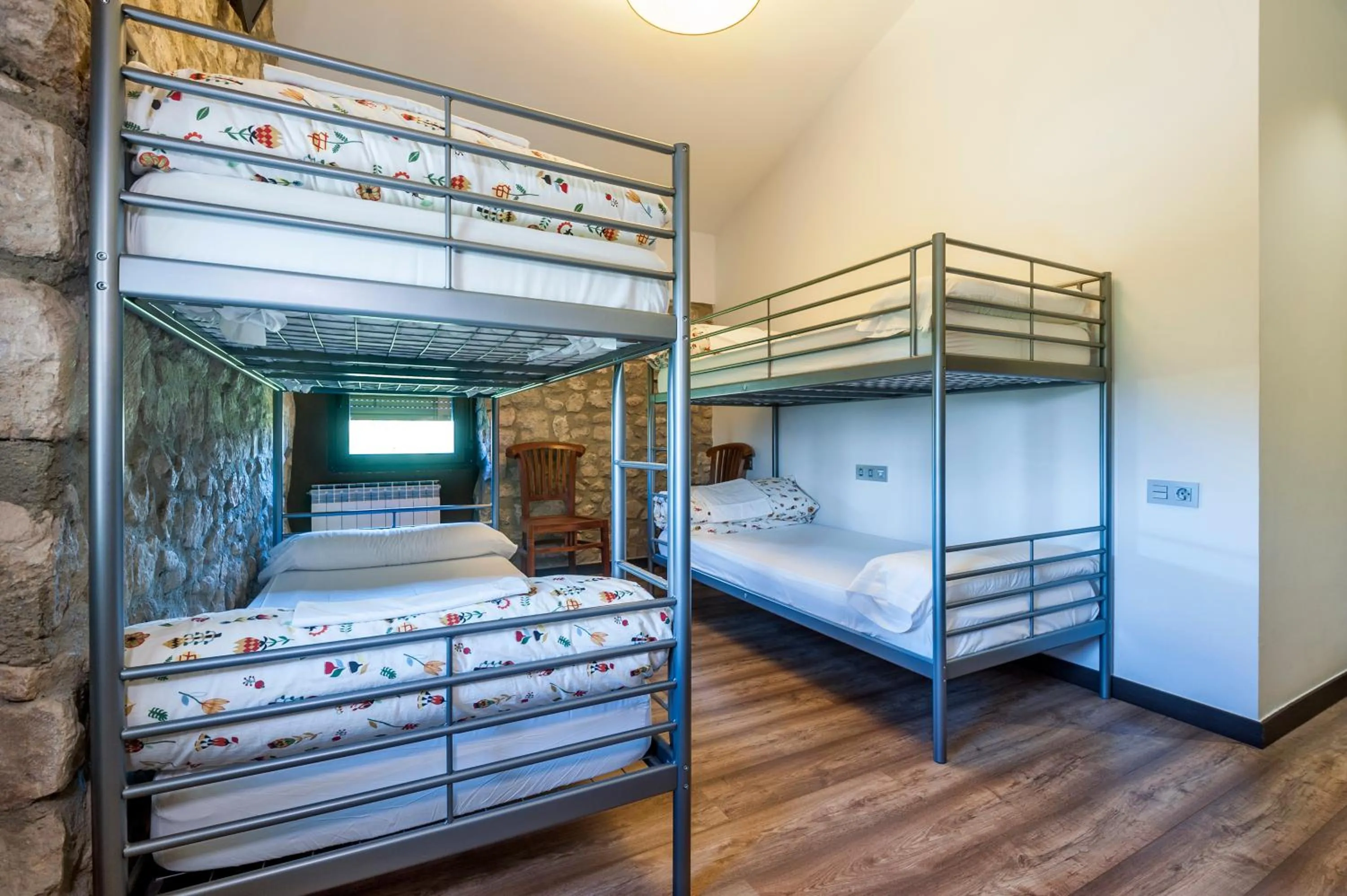 Photo of the whole room, Bed in Albergue turístico "La Fábrica"