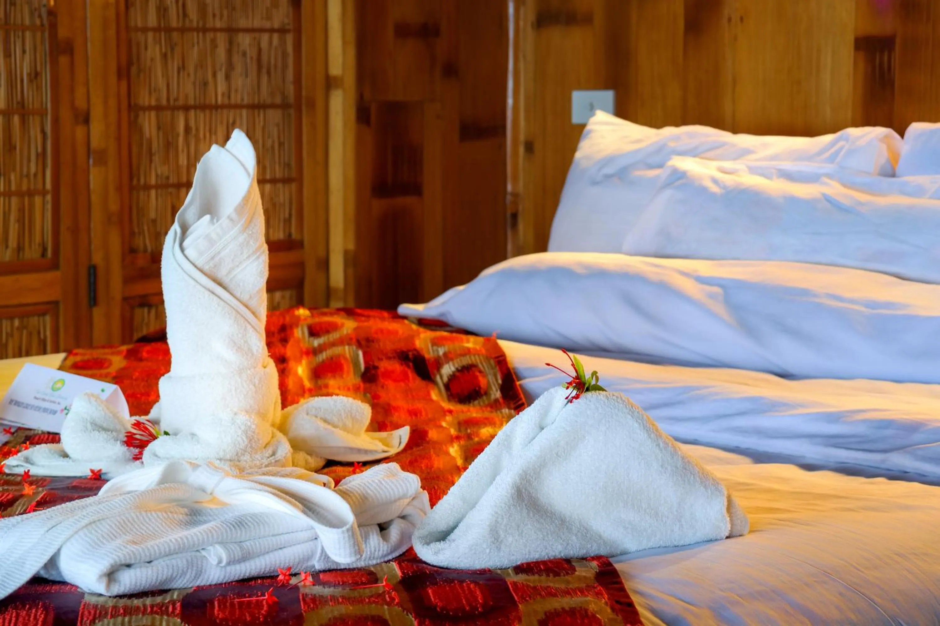 Decorative detail, Bed in The Coral Blue Oriental Beach Villas and Suites