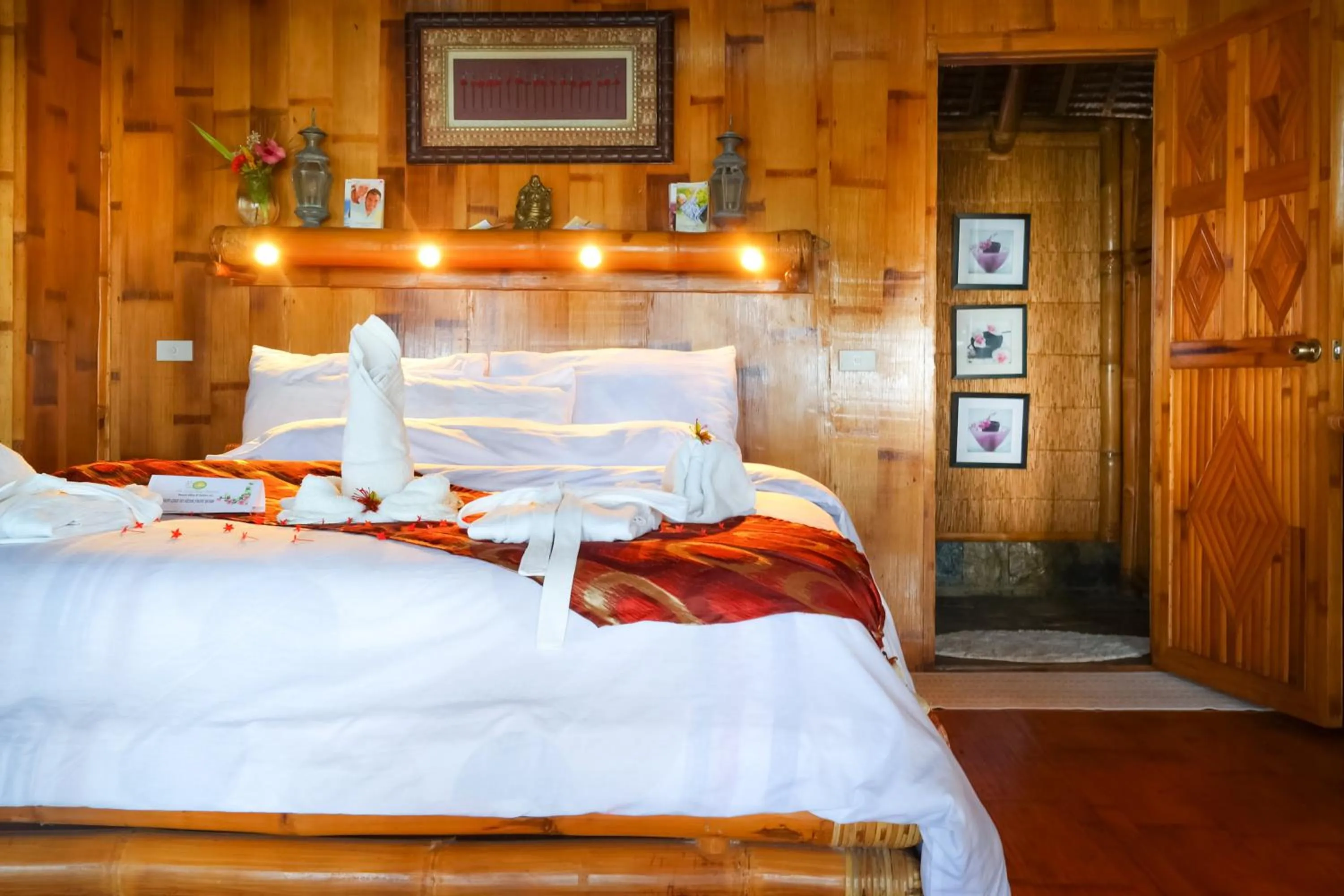 Decorative detail, Bed in The Coral Blue Oriental Beach Villas and Suites