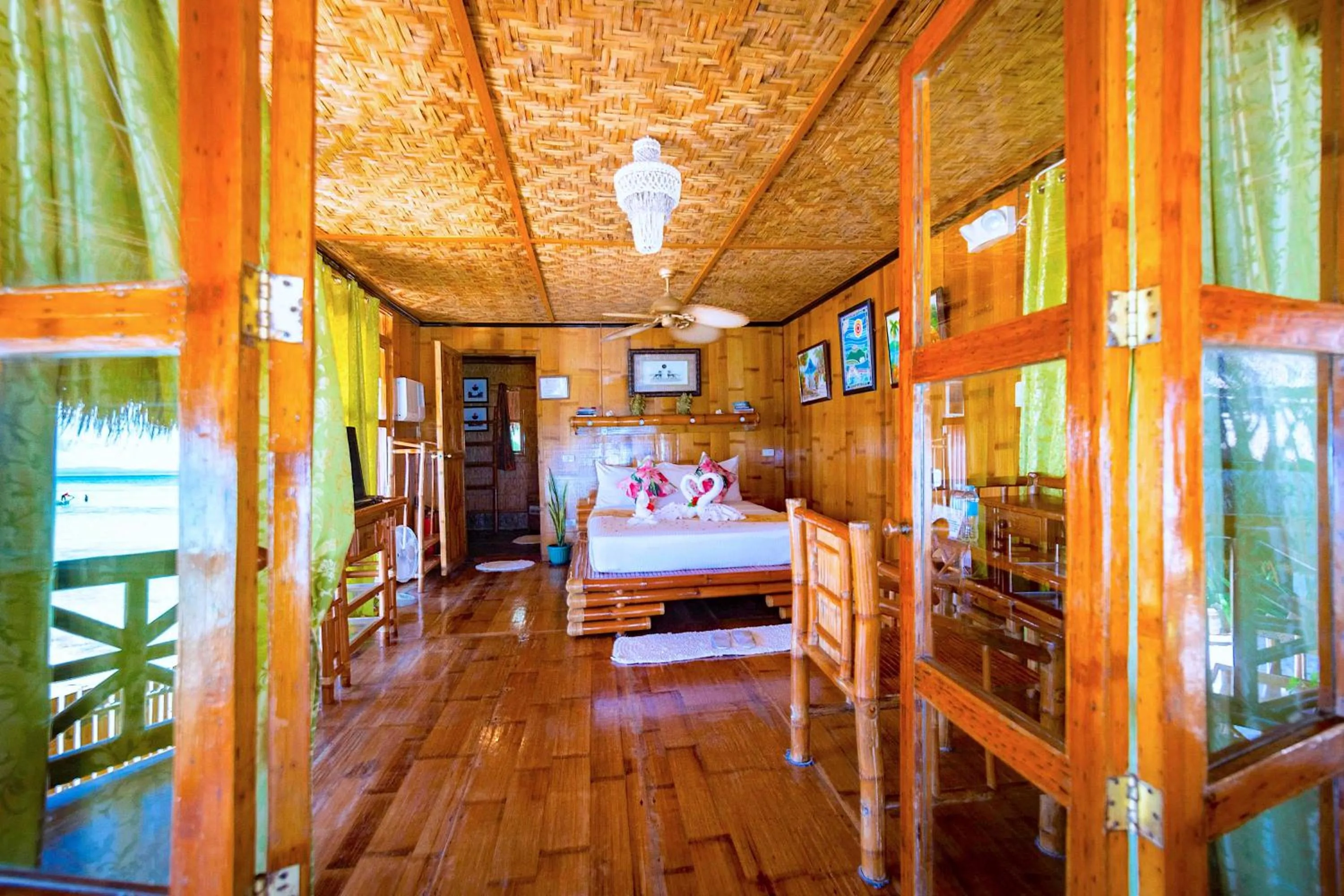 Property building, Bed in The Coral Blue Oriental Beach Villas and Suites