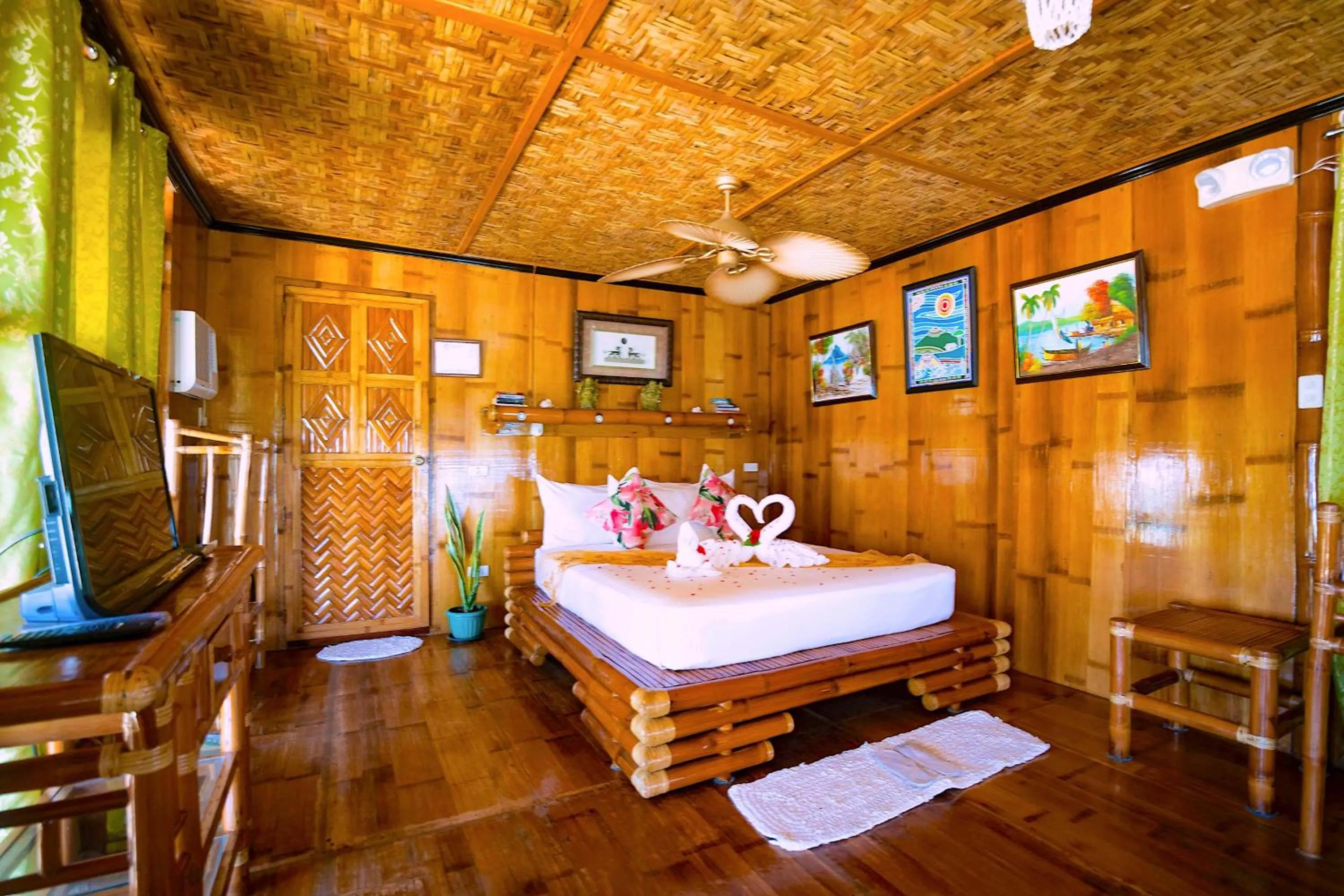 Property building, Bed in The Coral Blue Oriental Beach Villas and Suites