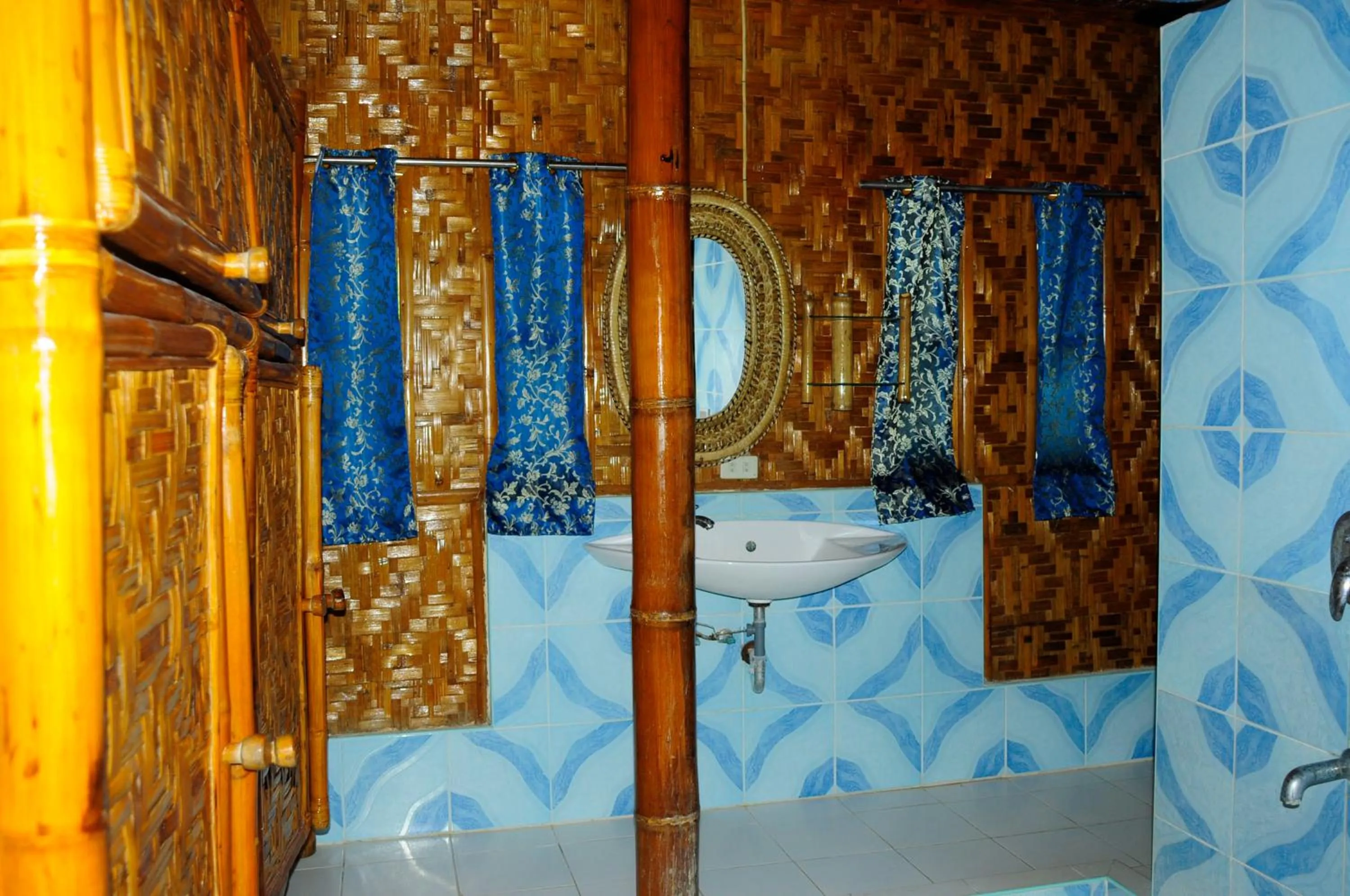 Shower in The Coral Blue Oriental Beach Villas and Suites