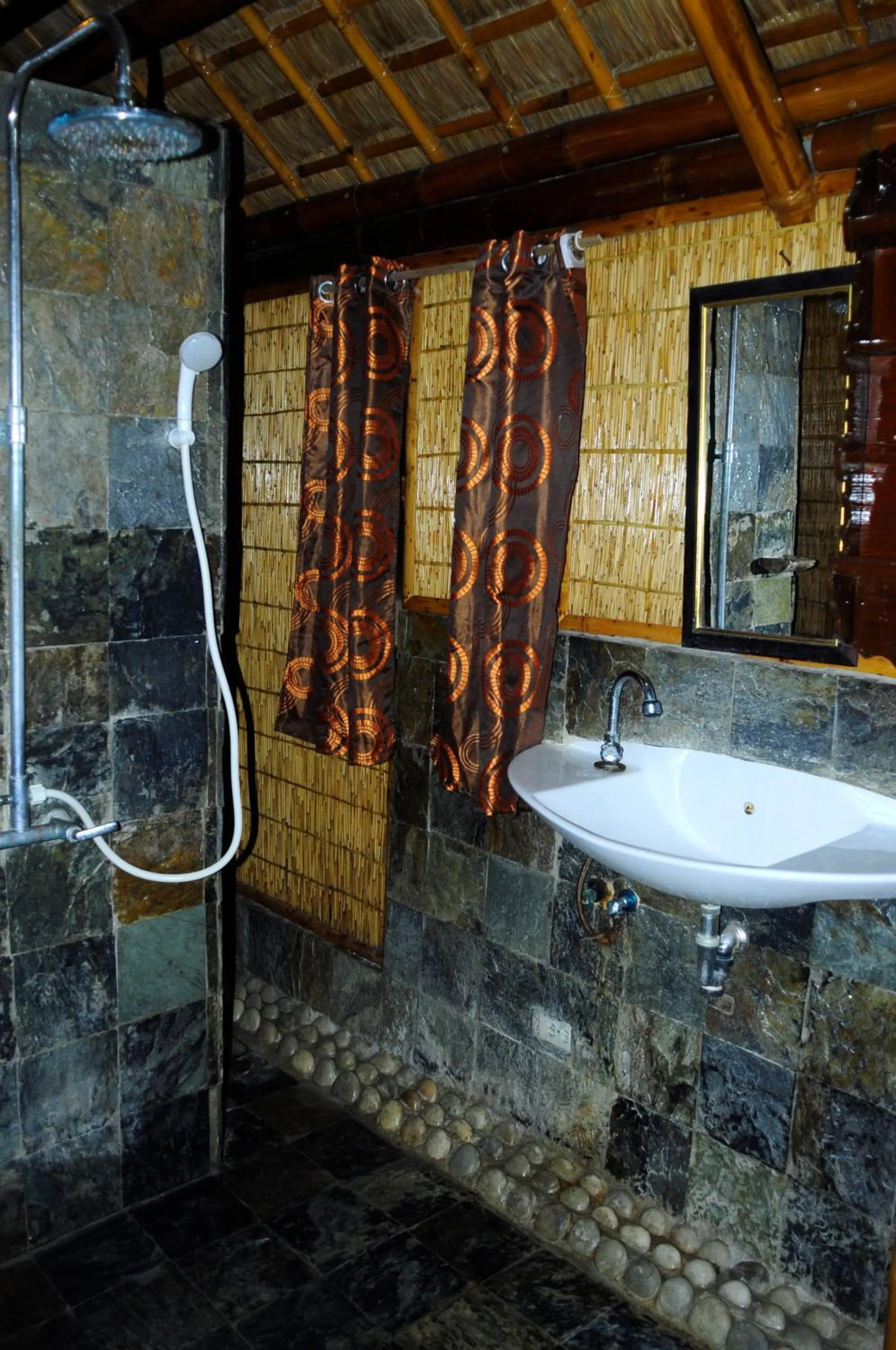 Shower in The Coral Blue Oriental Beach Villas and Suites