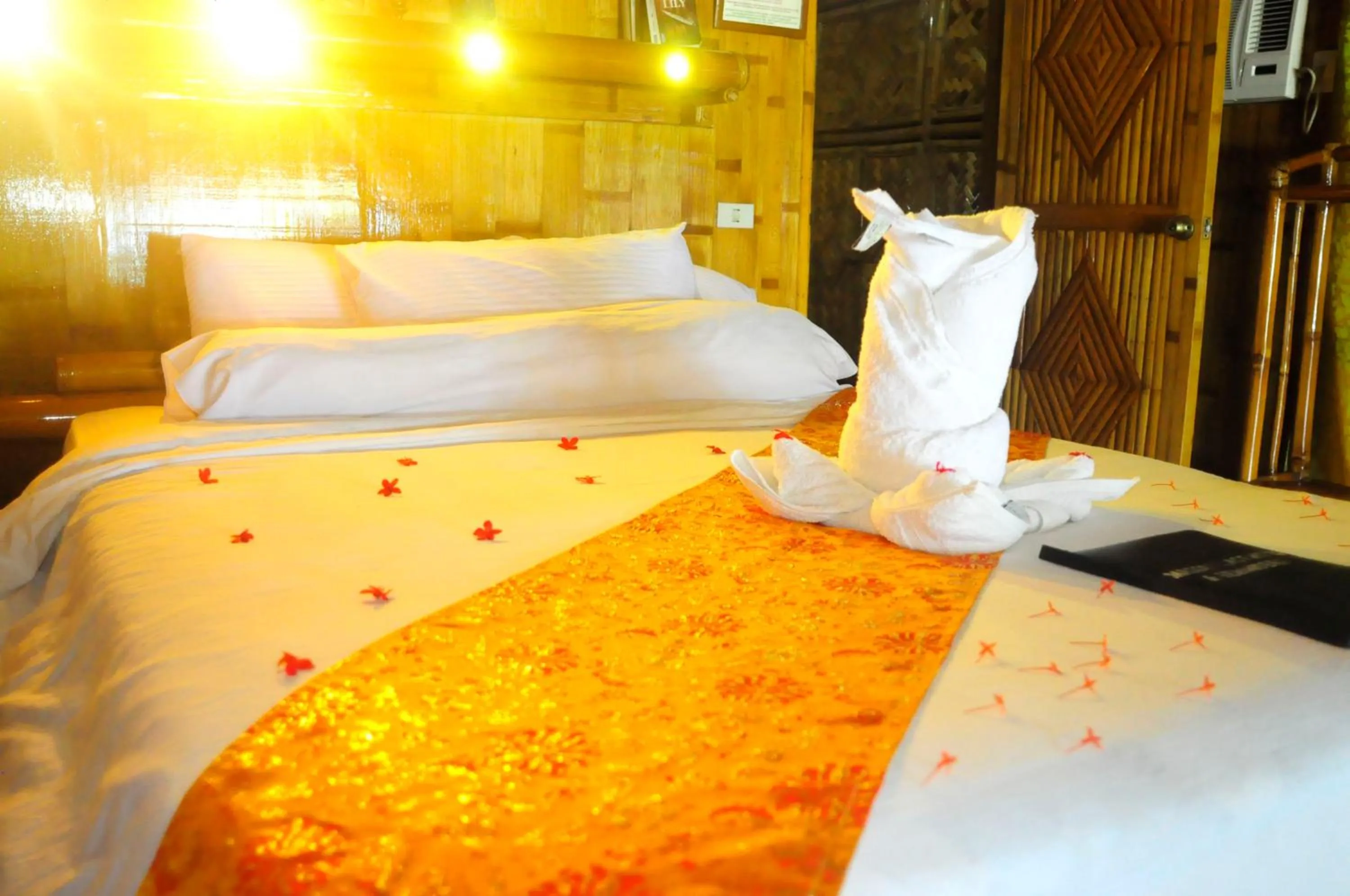 Decorative detail, Bed in The Coral Blue Oriental Beach Villas and Suites