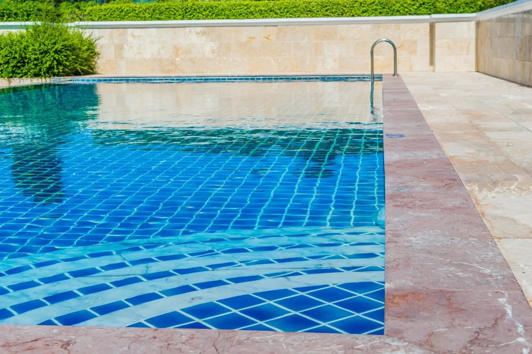 Swimming Pool in Holiday Inn Express & Suites Atlanta South - Stockbridge, an IHG Hotel