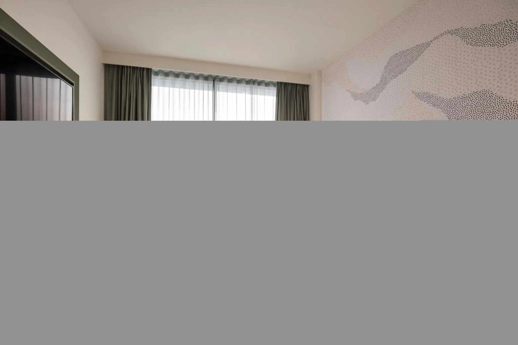 Photo of the whole room in voco Brussels City North by IHG