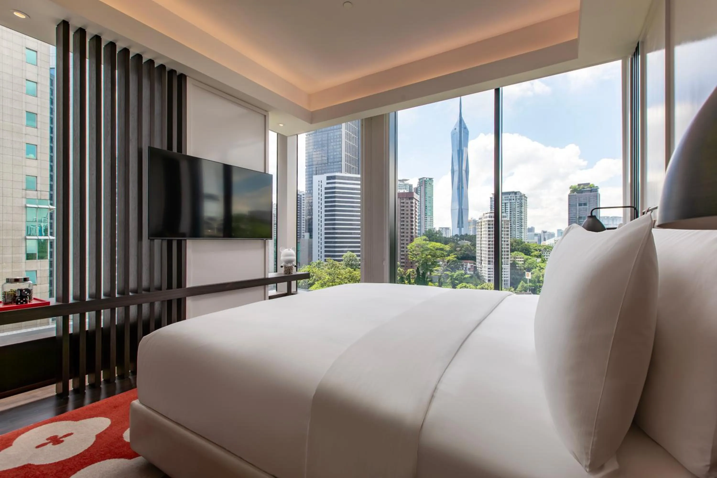Bed in Hotel Indigo Kuala Lumpur on the Park by IHG