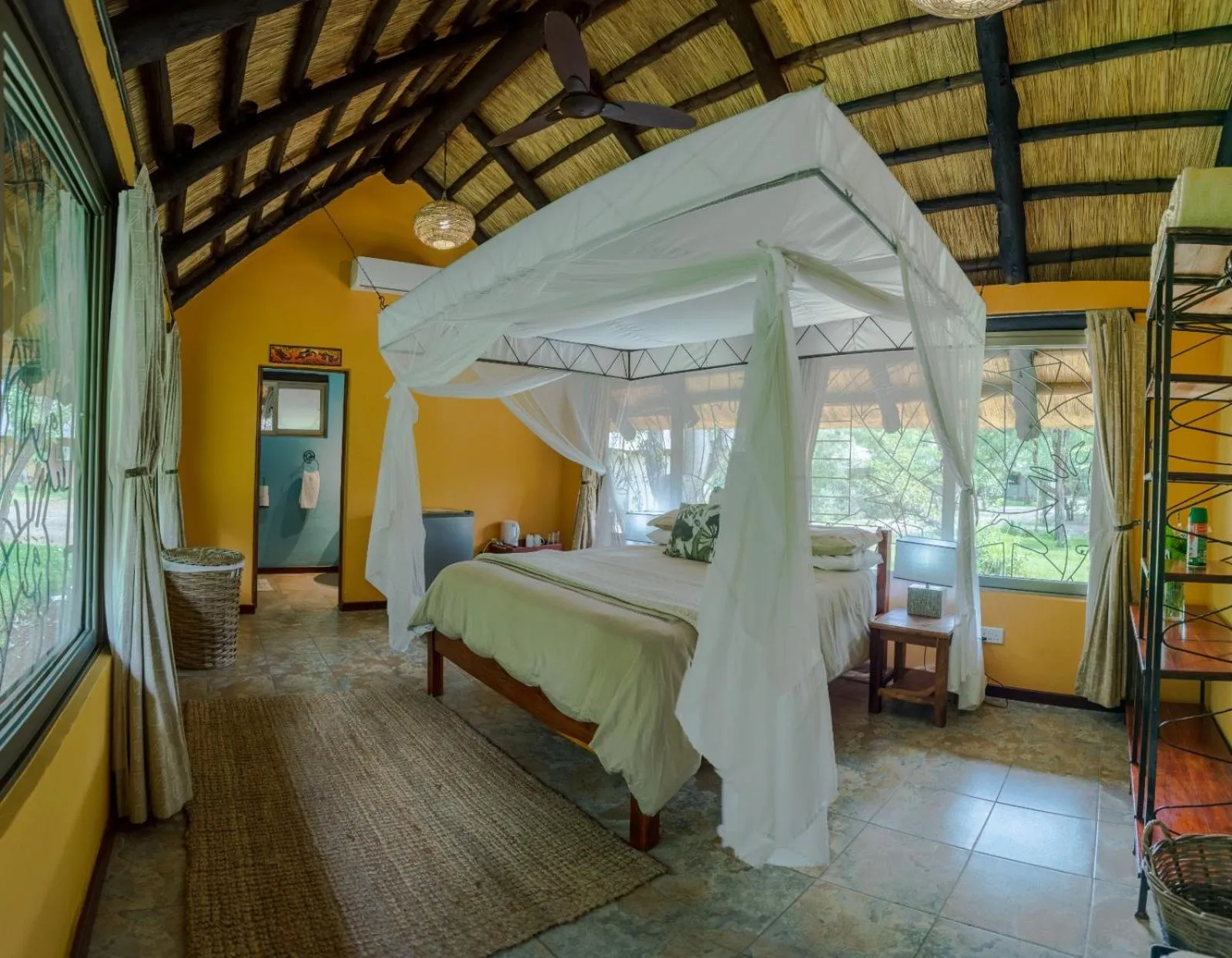Bed in Maramba River Lodge